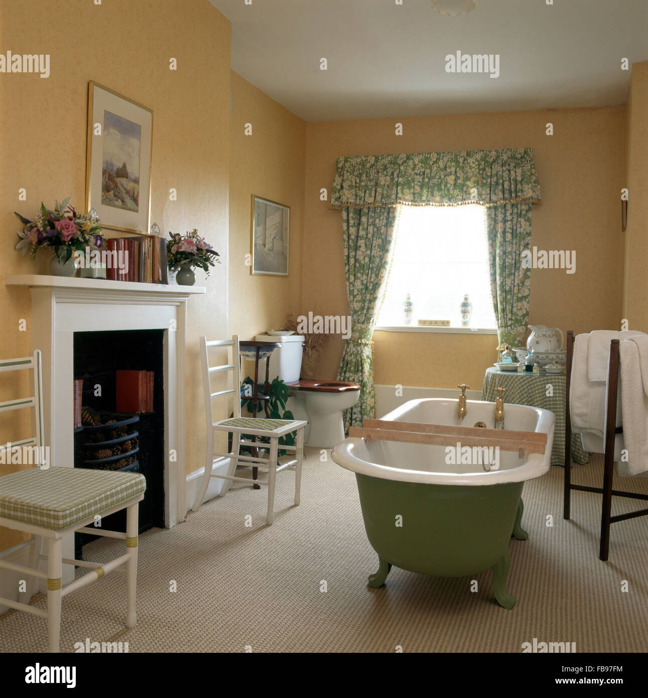 Pale Green Roll Top Bath In Country Bathroom With Green Floral