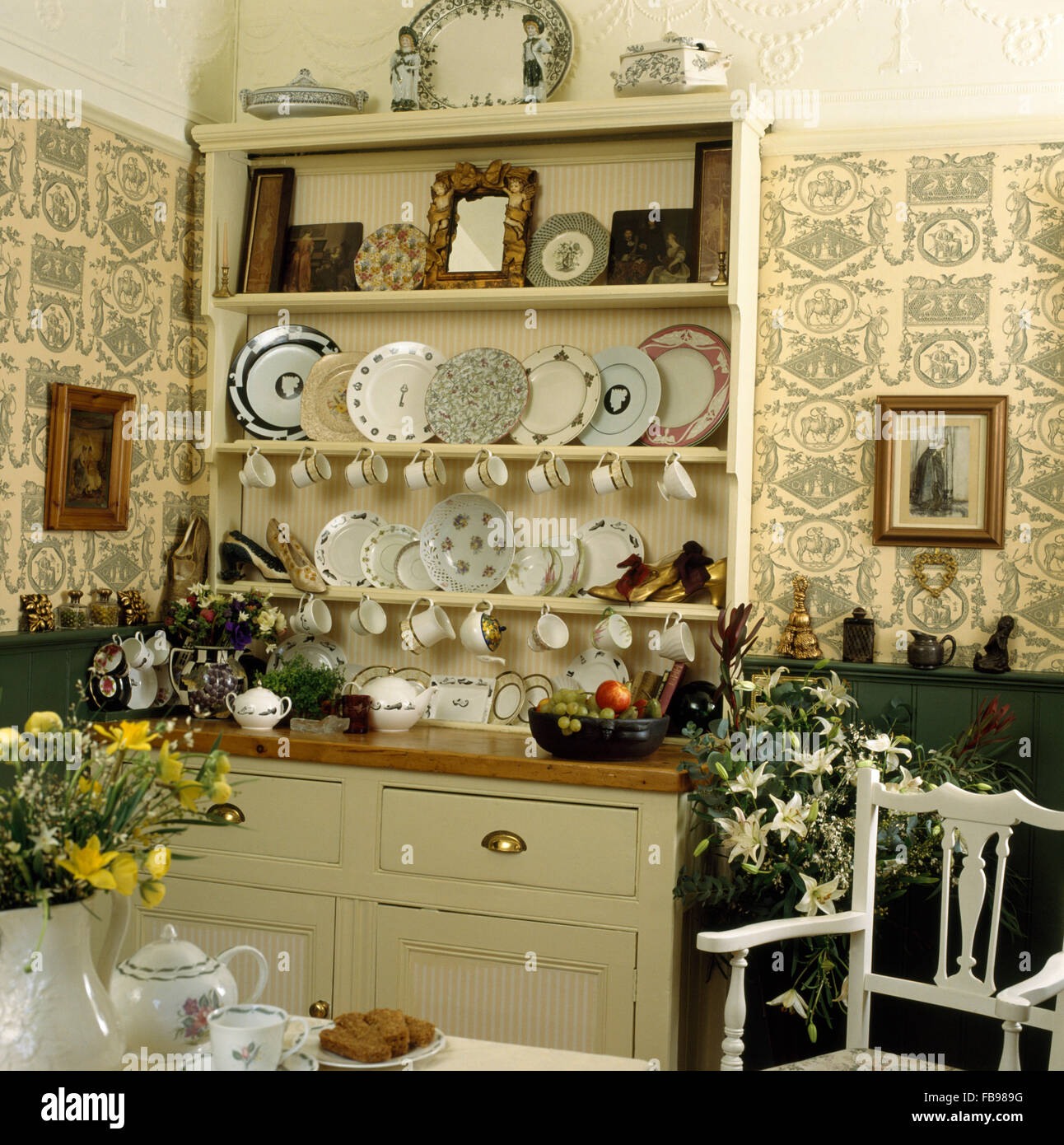 Cream Painted Dresser And Painted Wallpaper In Eighties Dining
