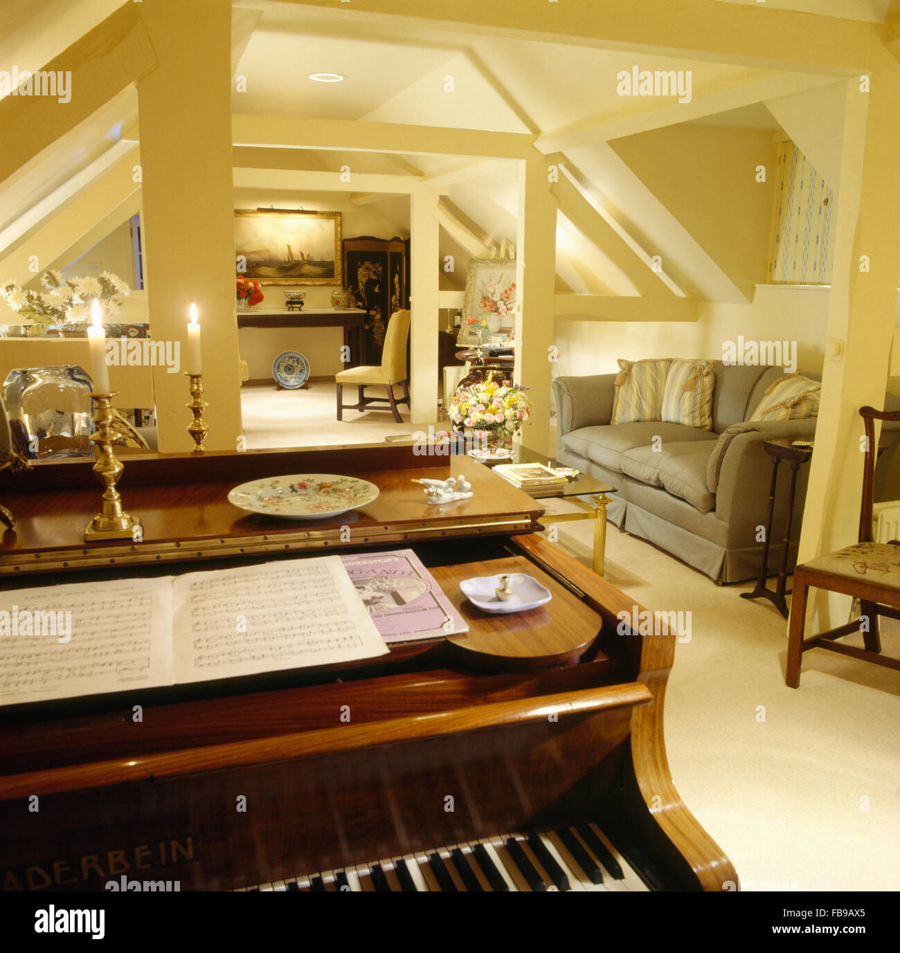 Piano in eighties loft conversion living room with painted beams and a ... - Eighties Loft Decorating Inspiration