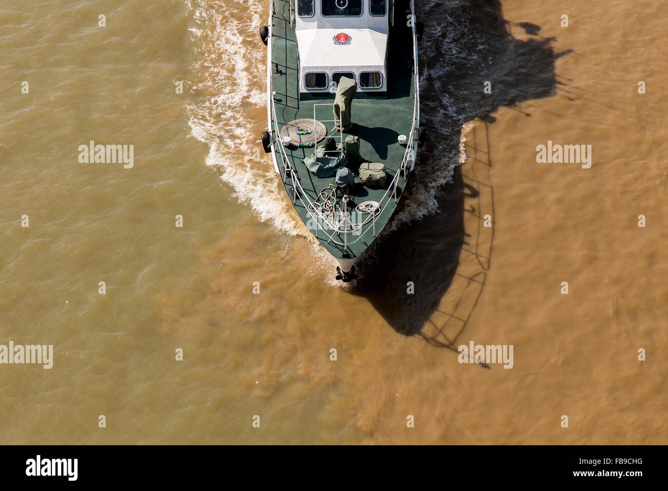 Coastguard boat navigating around Macau Stock Photo