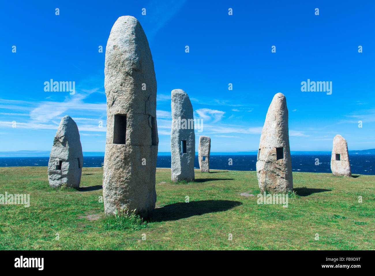 Ancient Monuments With Holes In Field Stock Photo