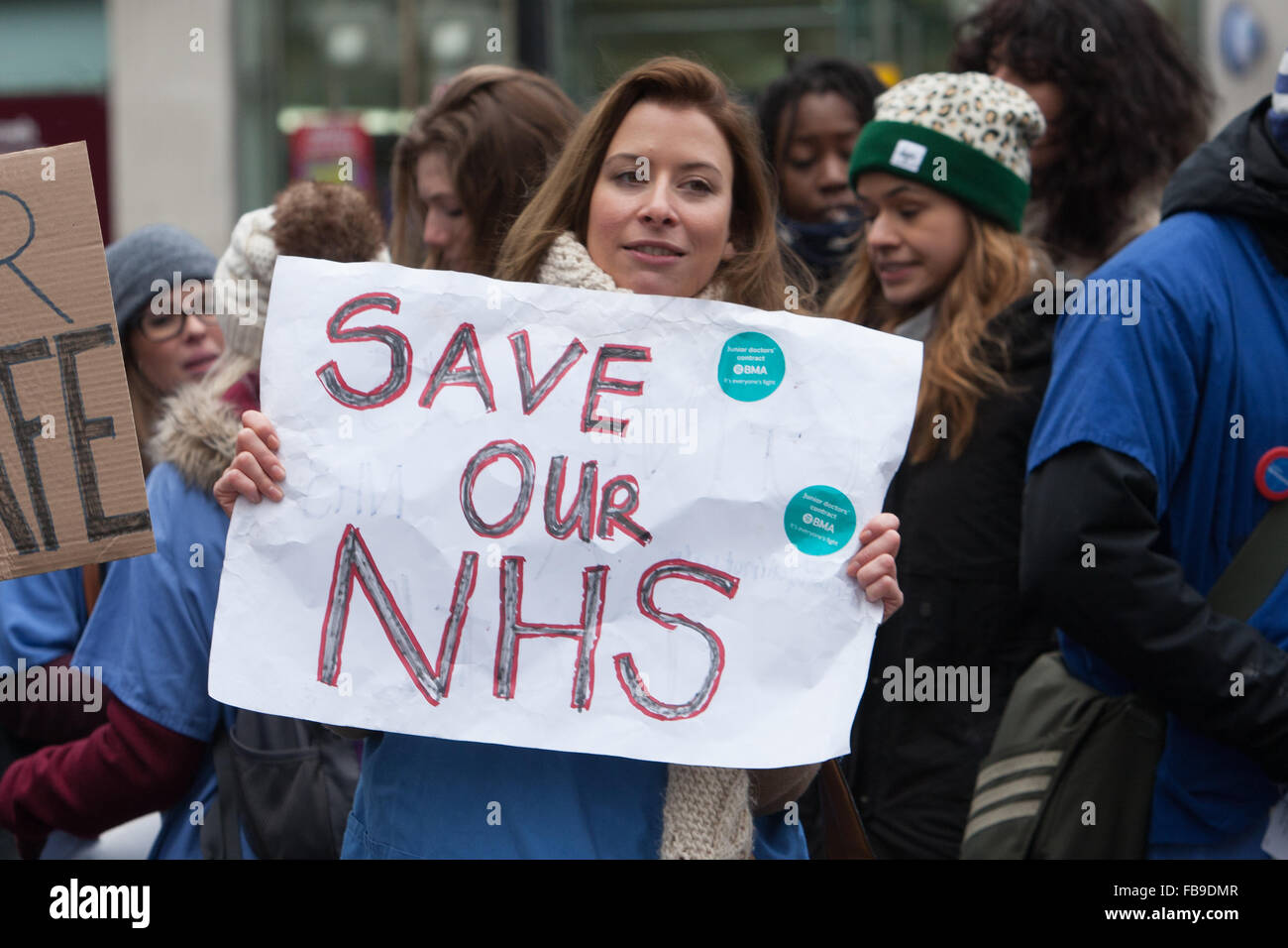 London, UK. 12th January, 2016. A group of Striking Junior Doctors from Kings College Hospital protest outside Brixton Underground station, London, UK. Credit:  martyn wheatley/Alamy Live News Stock Photo