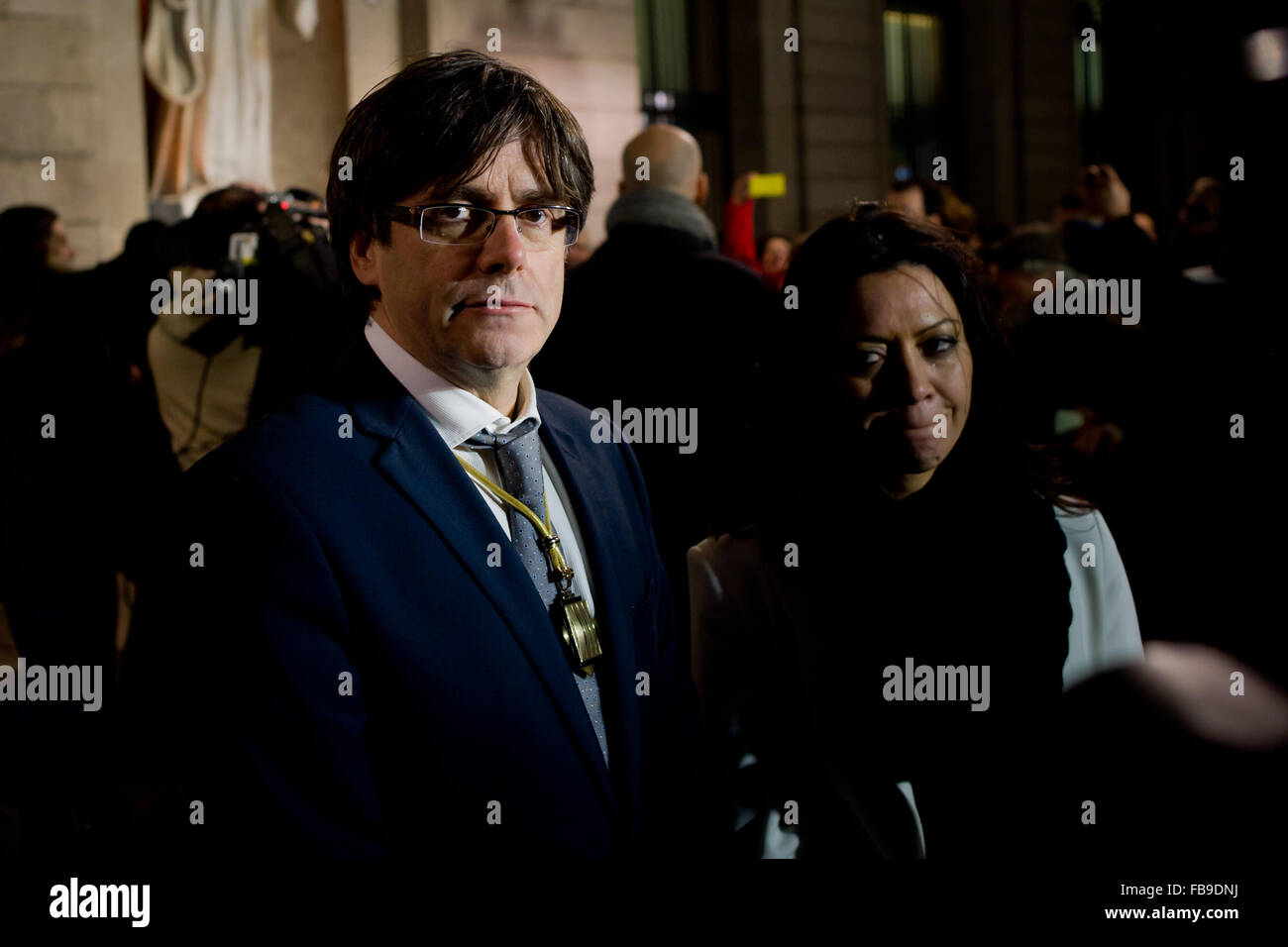 Barcelona, Spain. 12th January, 2016. Carles Puigdemont and his wife  Marcela Topor  are seen outside the Palau de la Generalitat (Catalan government headquarters)  after having been invested as a new president of Catalonia in Barcelona, Spain on 12 January, 2016. The new government of Catalonia has a secessionist plan that seeks independence from Spain and to proclaim the Catalan Republic in the next 18 months. Credit:   Jordi Boixareu/Alamy Live News Stock Photo