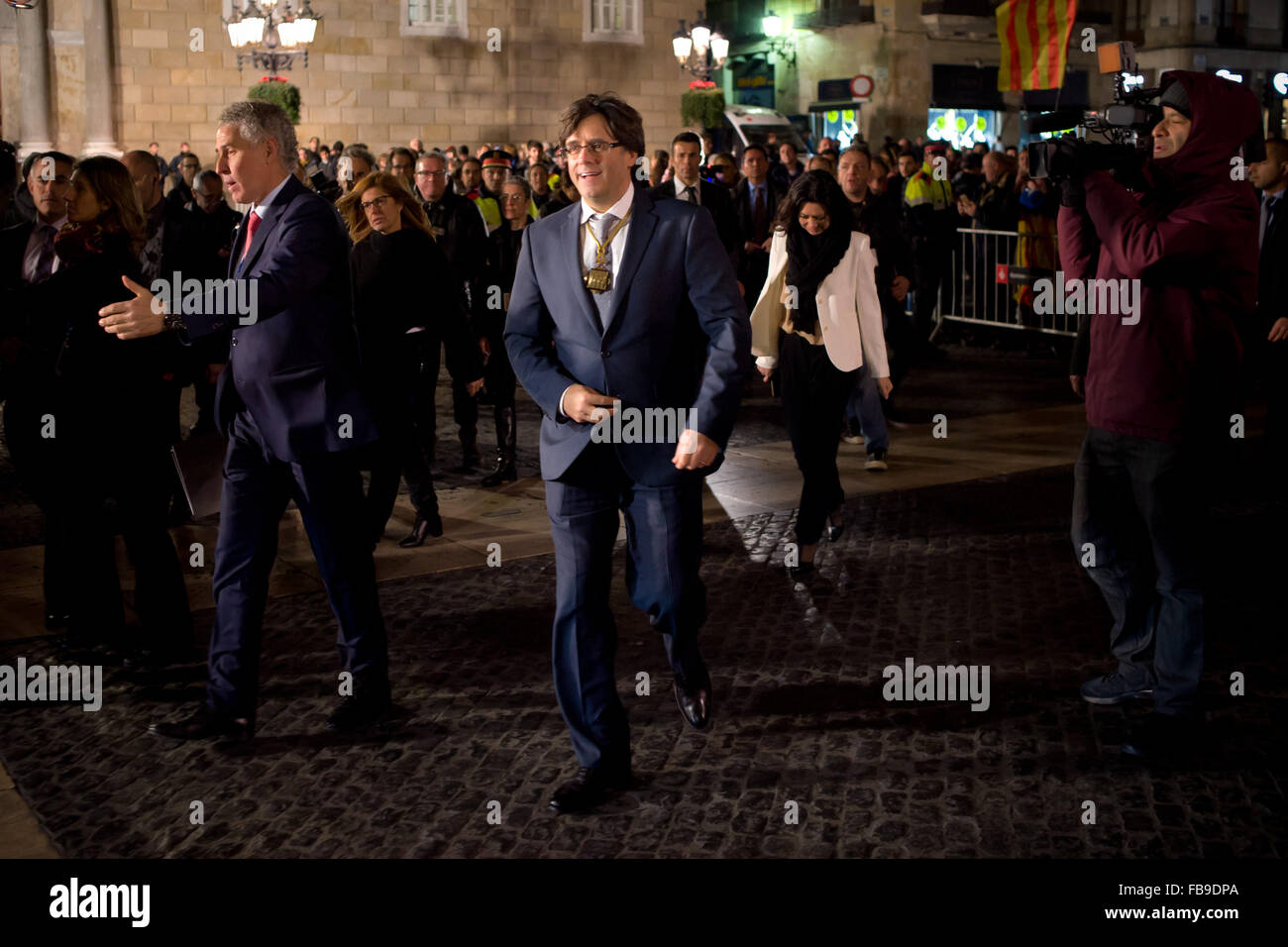Barcelona, Spain. 12th January, 2016. Carles Puigdemont leaves  the Palau de la Generalitat (Catalan government headquarters)  after having been invested as a new president of Catalonia in Barcelona, Spain on 12 January, 2016. The new government of Catalonia has a secessionist plan that seeks independence from Spain and to proclaim the Catalan Republic in the next 18 months. Credit:   Jordi Boixareu/Alamy Live News Stock Photo