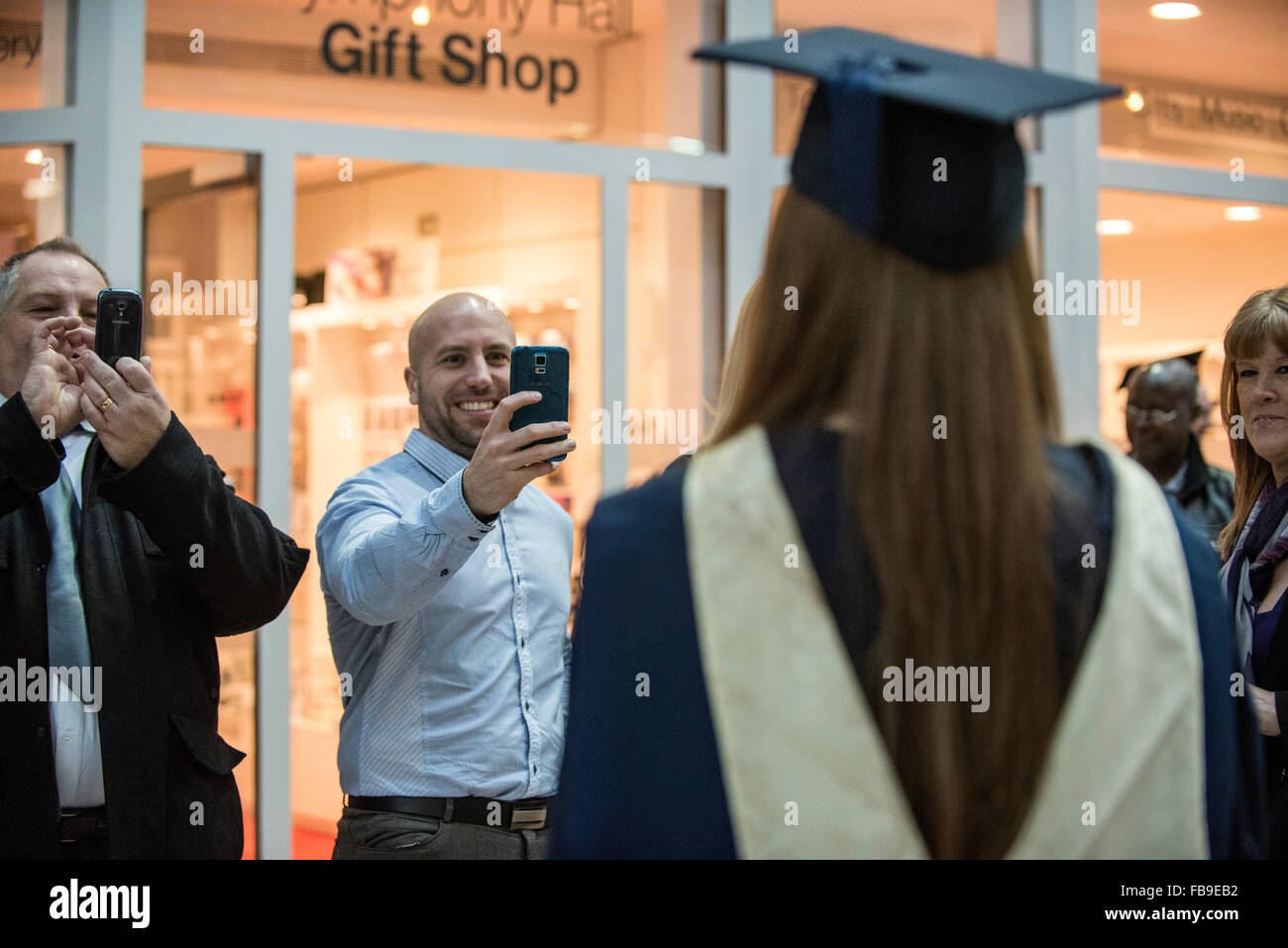 Family smart phone photos of graduand, graduation ceremony UK Stock ...