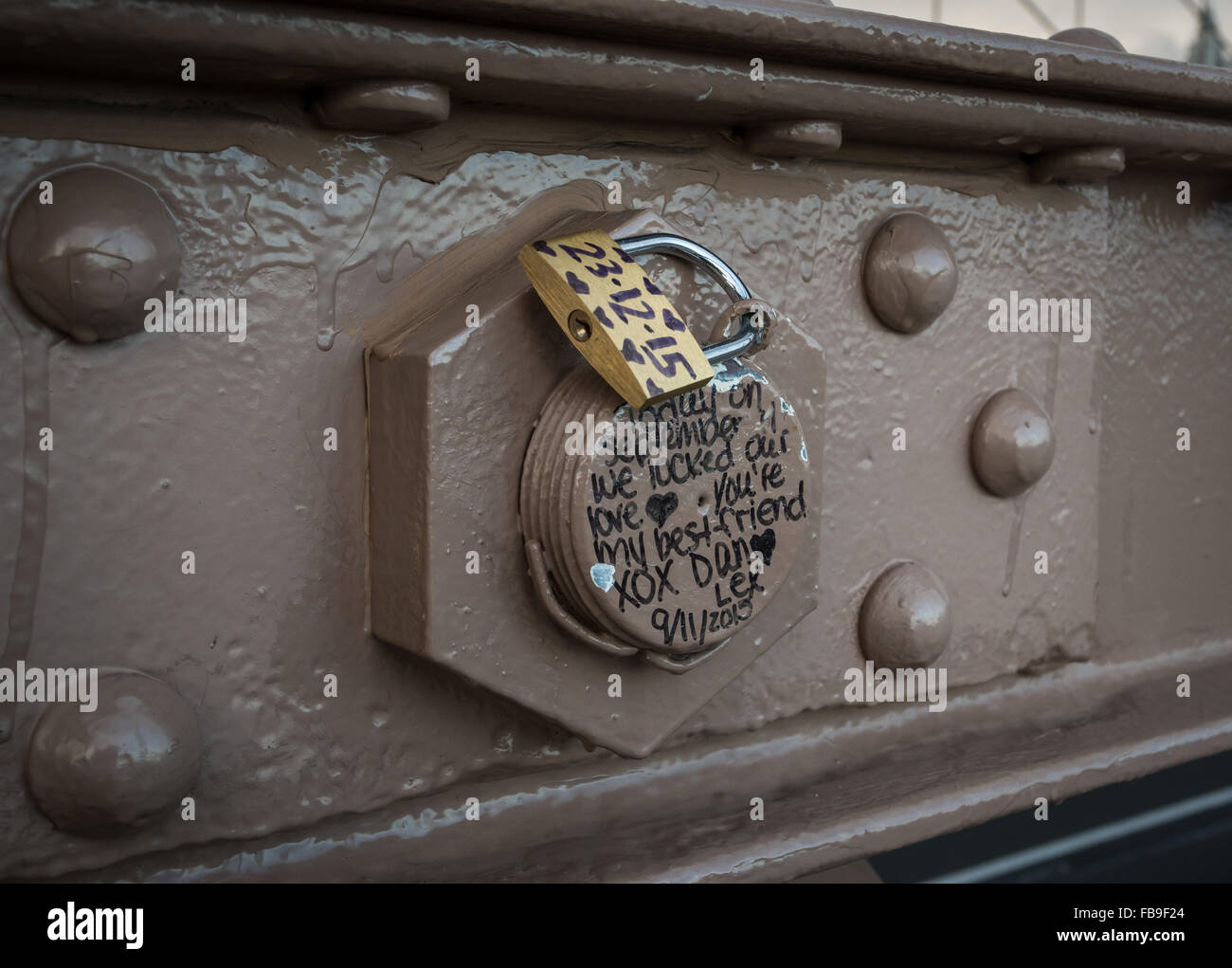 Love lock / padlock and note on Brooklyn Bridge, New York City