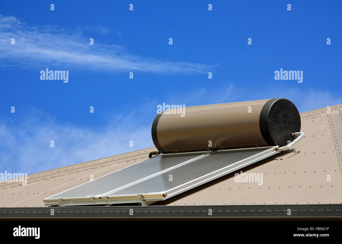 solar panels used to heat water on a roof Stock Photo