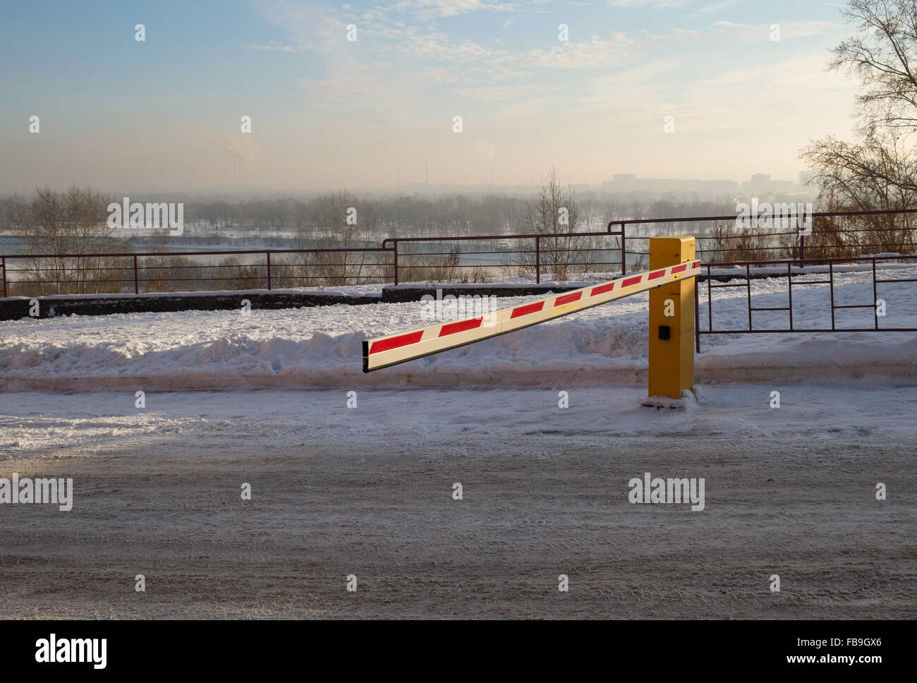 Vehicle security barrier on parking in winter Stock Photo