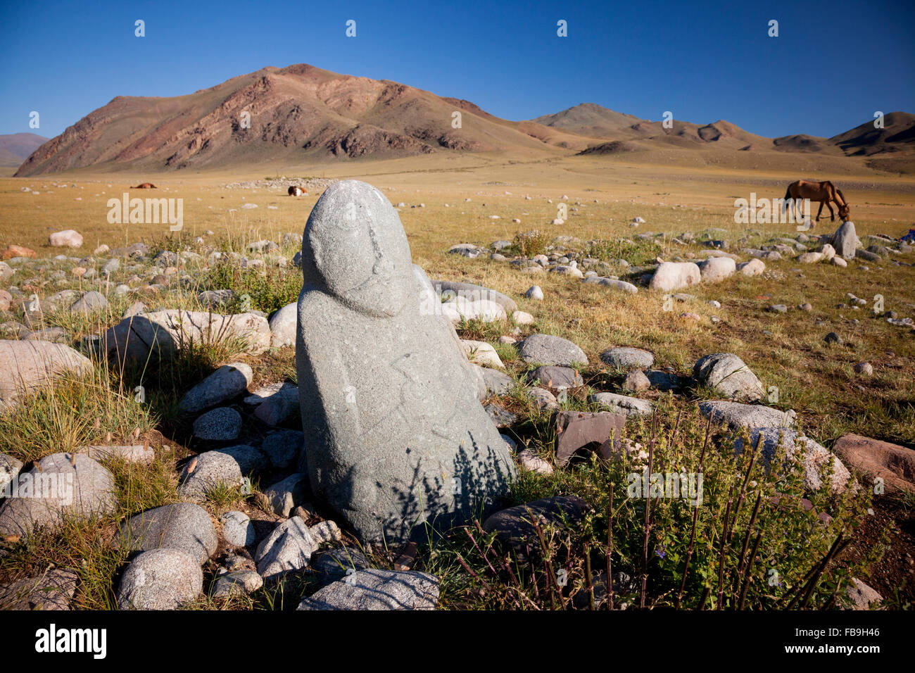 A thousands of year old Turkic grave stone in Kharkhiraa Turgen National Park, Mongolia. Stock Photo