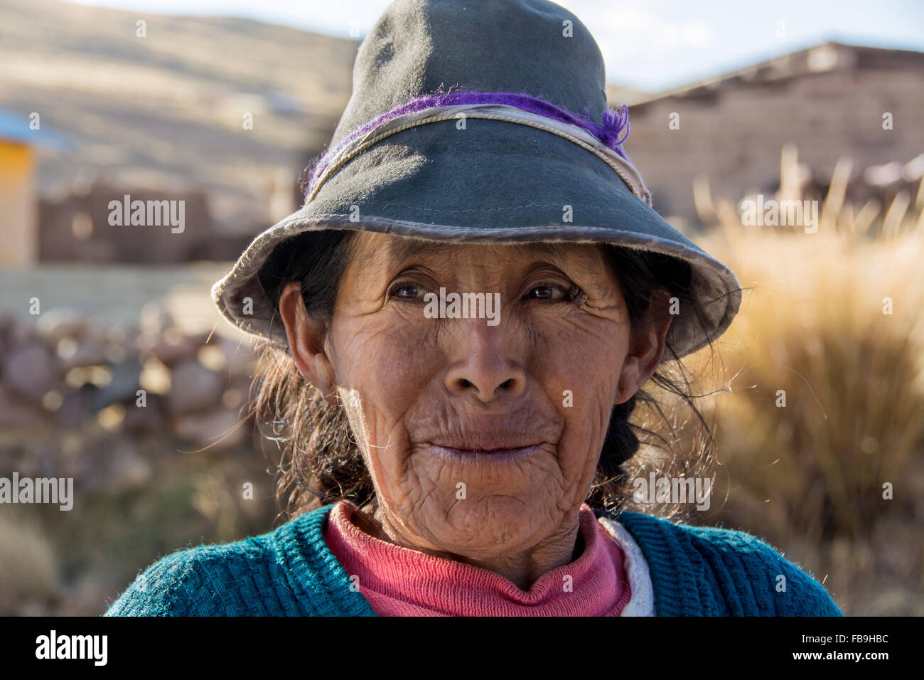 Indigenous woman with hat, Cusco, Peru Stock Photo