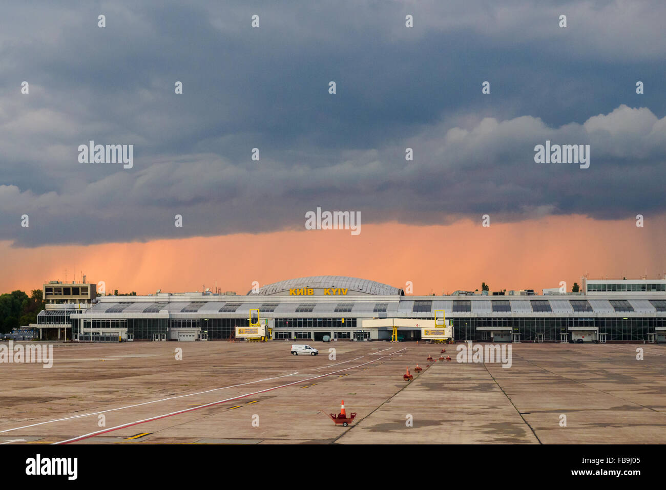 Building of Boryspil airport at sunset when rain is coming, Kiev, Ukraine Stock Photo