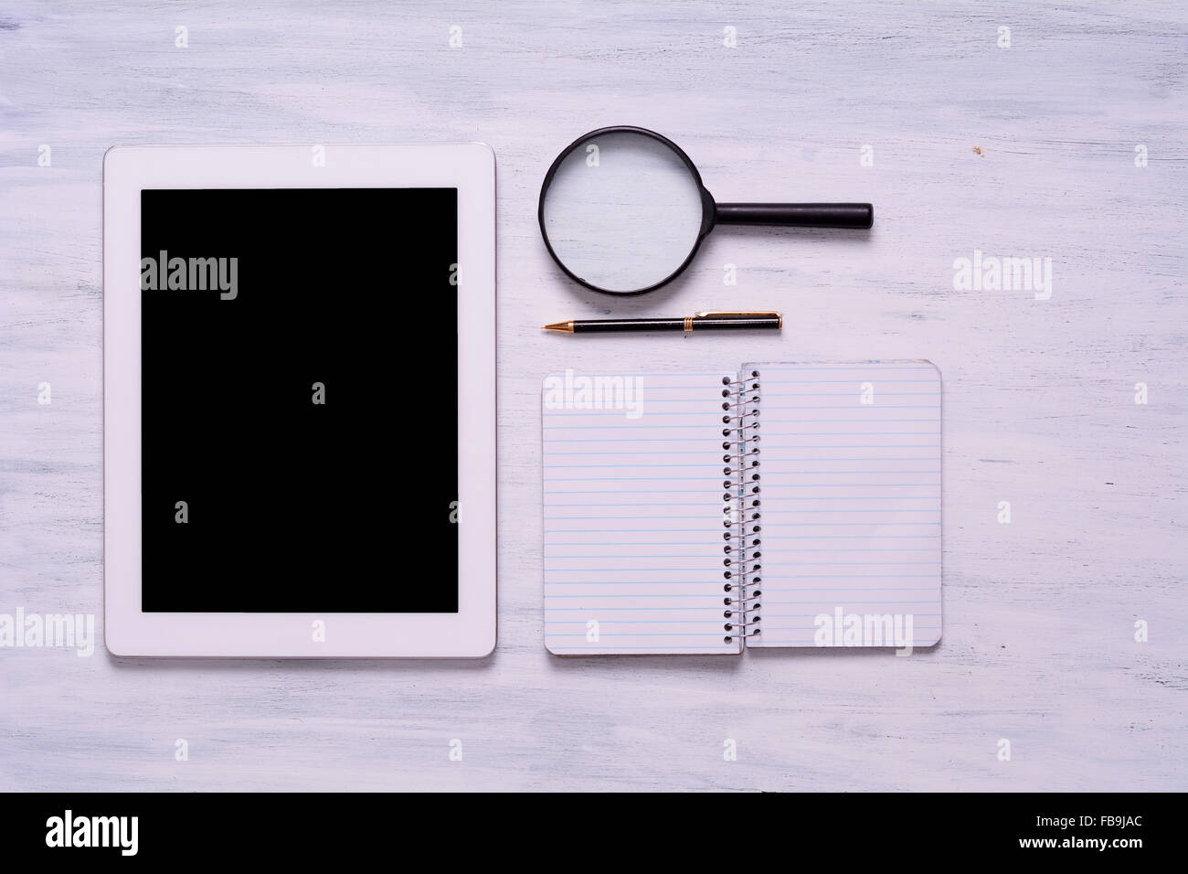 Notebook laptop smartphone magnifying hi-res stock photography and ...