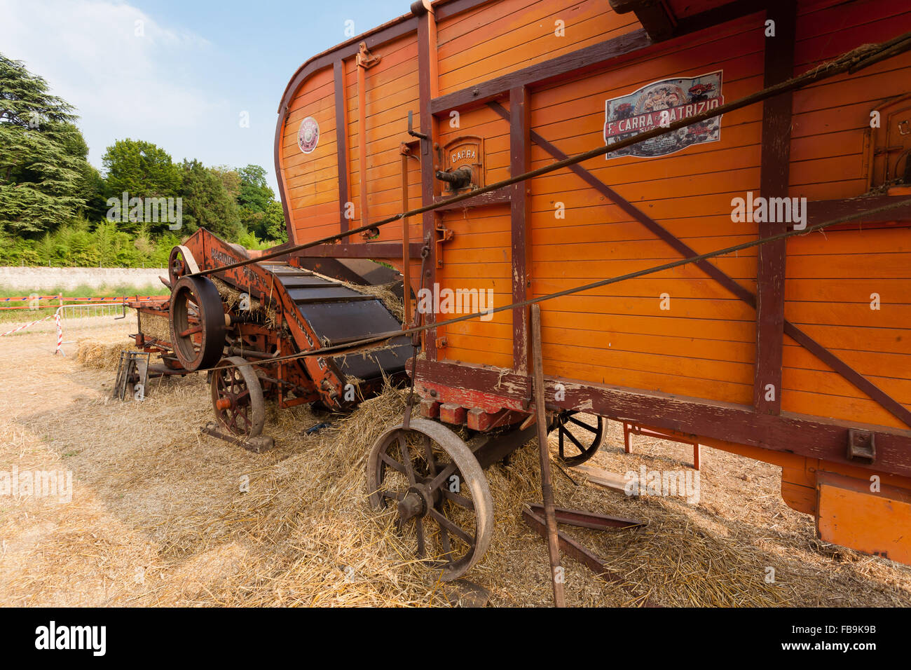 Old straw baler, agricultural vehicle, rural life Stock Photo