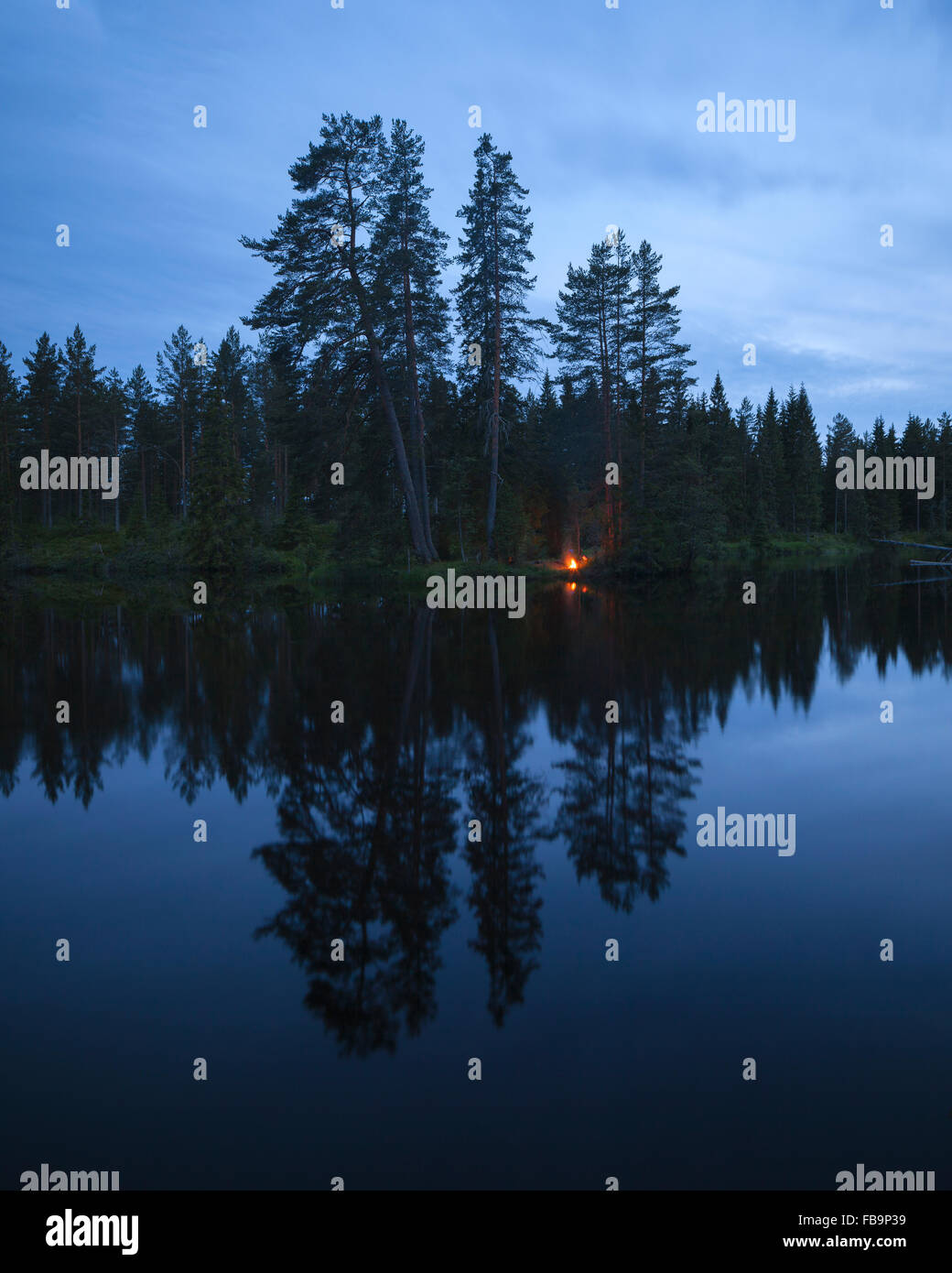 Sweden, Vastmanland, Svartalven, Tranquil lake at dusk Stock Photo