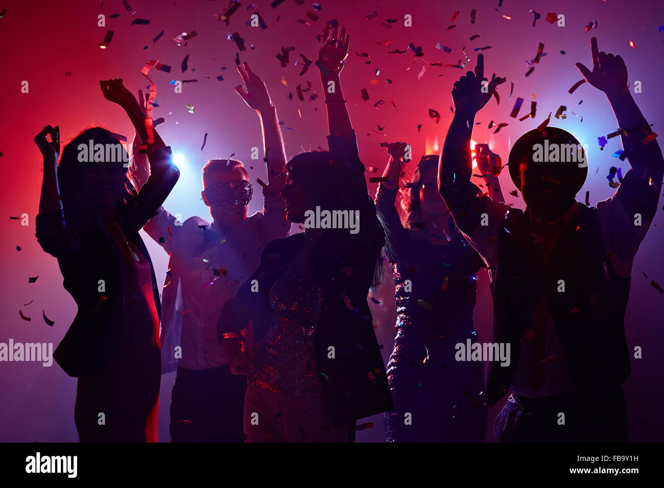 Party people having fun in nightclub Stock Photo