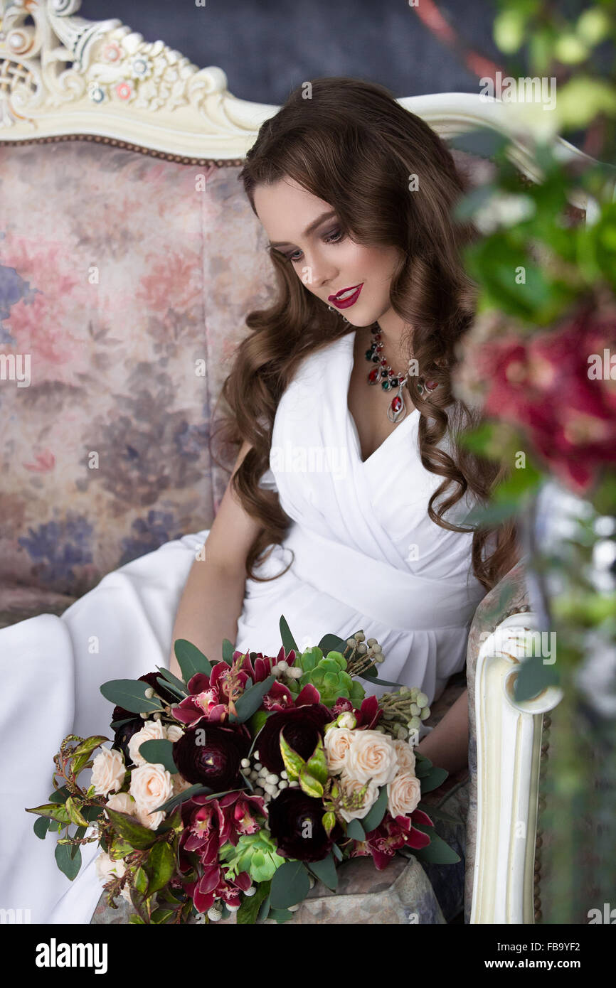 stylish bride holds in hand a bouquet from succulents Stock Photo