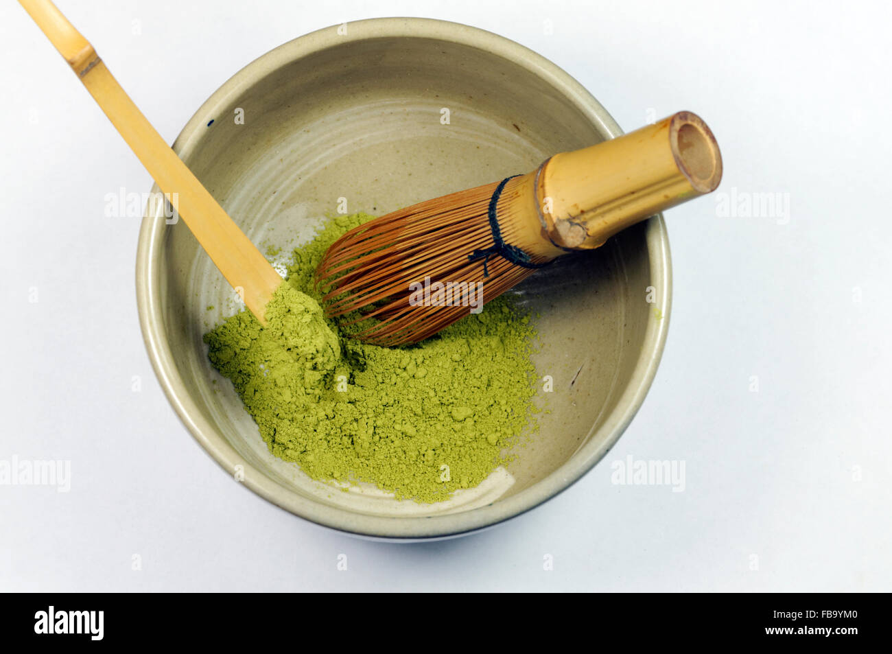 Matcha tea in a Chawan traditional tea bowl, Chasan Whisk and chashaku tea scoop, Japanese tea ceremony. Stock Photo