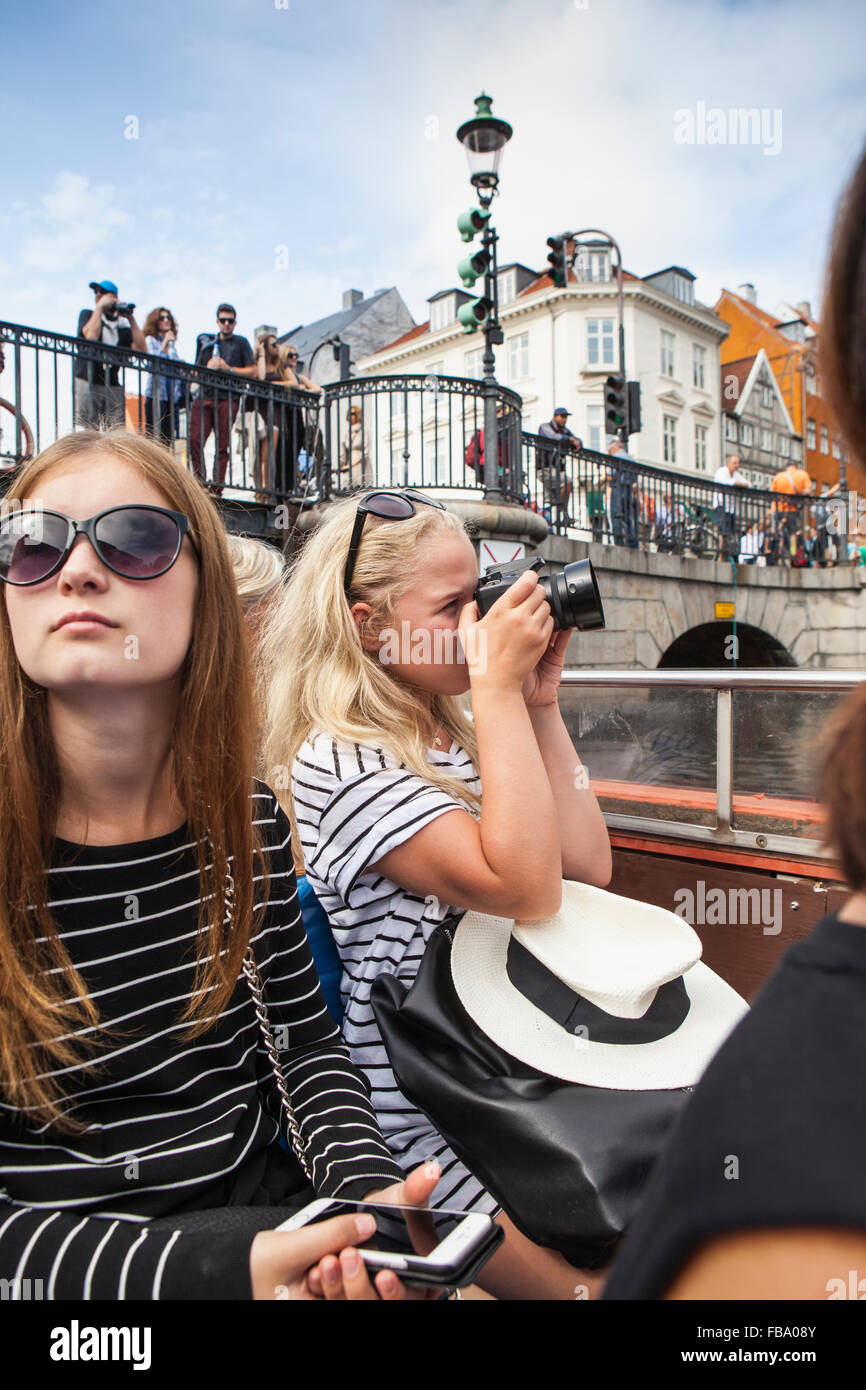 Denmark, Copenhagen, Teenage girls (14-15, 16-17) on sightseeing cruise Stock Photo