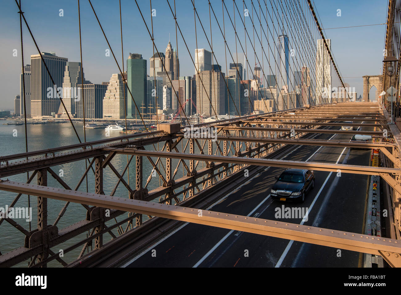 Brooklyn Bridge with Lower Manhattan skyline behind, New York, USA Stock Photo