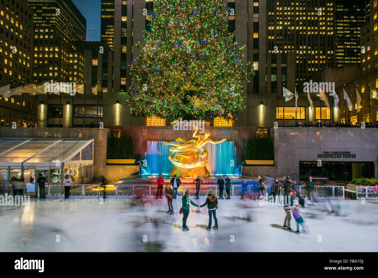 Lower Plaza of Rockefeller Center with ice skating rink and Christmas