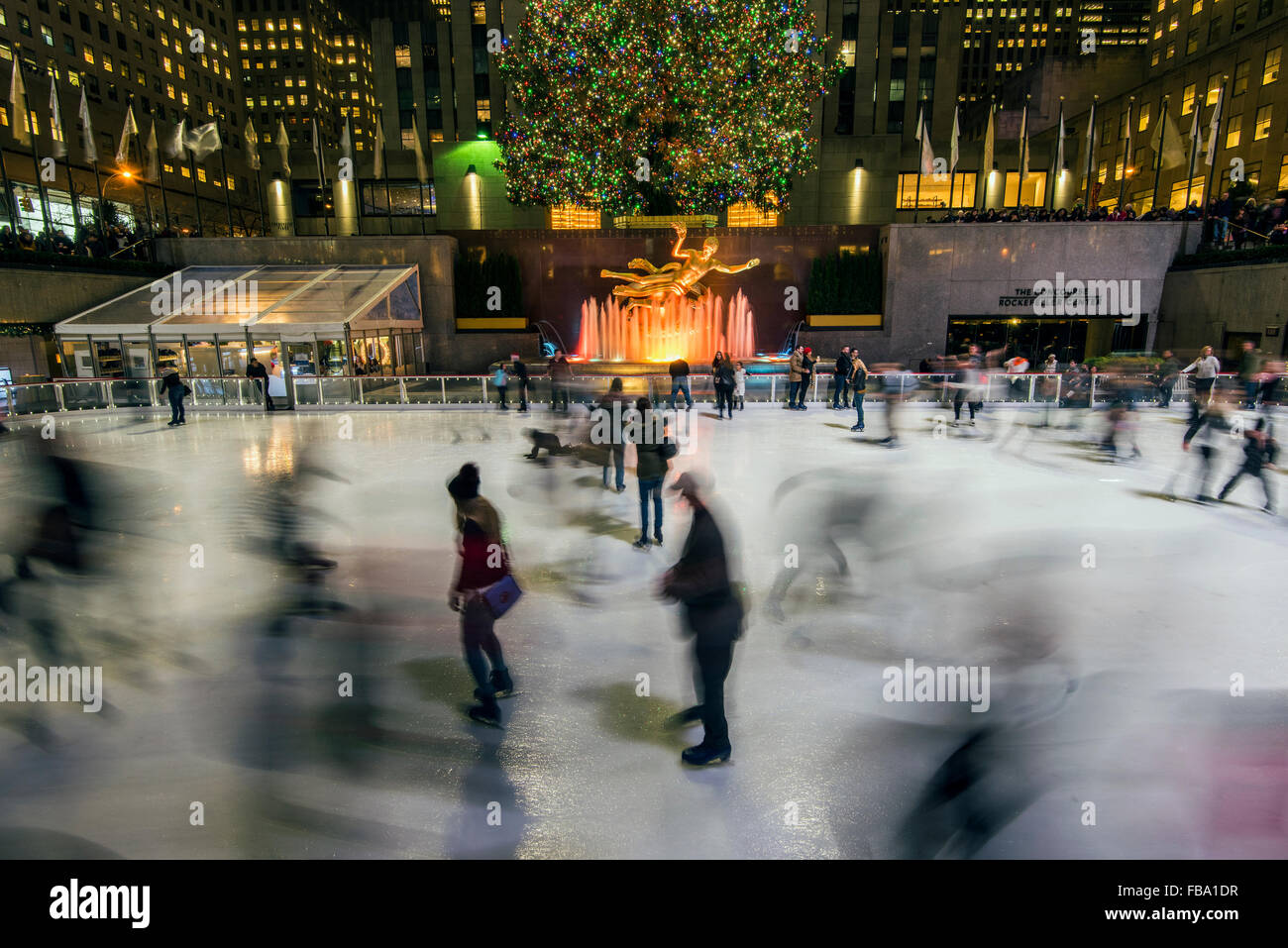 Lower Plaza of Rockefeller Center with ice skating rink and Christmas