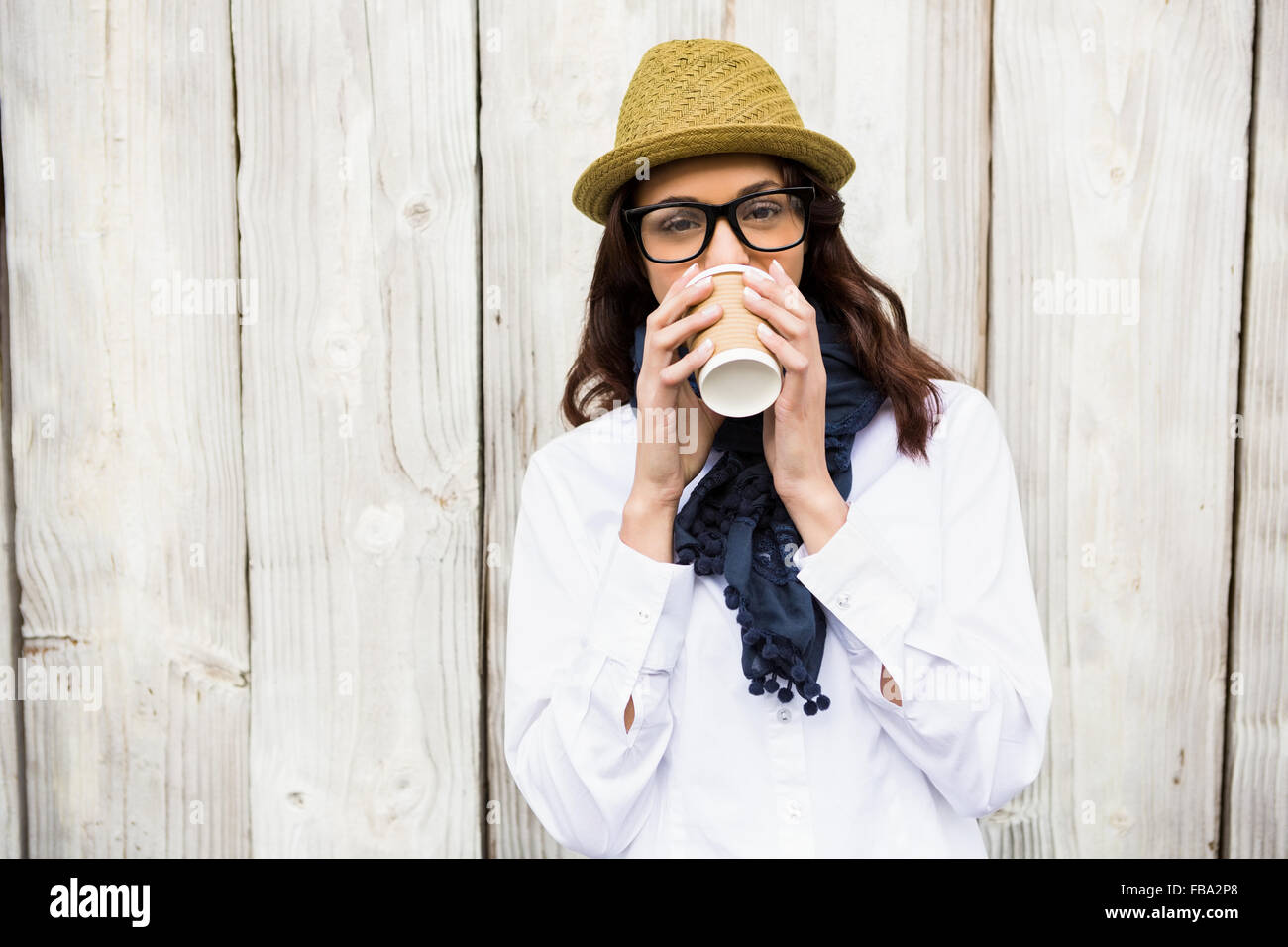 Hipster woman with take-away coffee Stock Photo