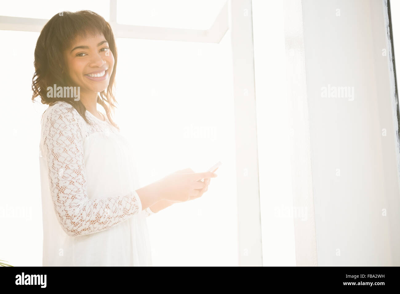 Woman and texting and laughing hi-res stock photography and images - Alamy