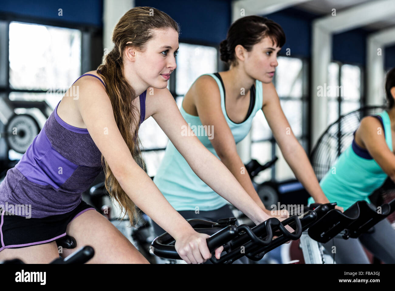 Fit woman working out at spinning class Stock Photo - Alamy