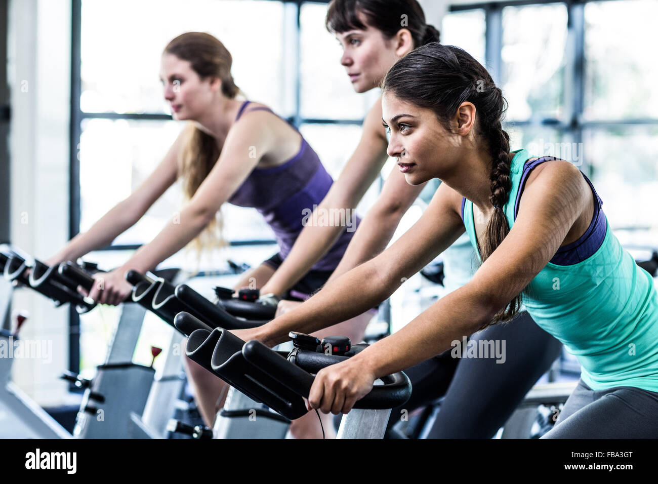 Fit woman working out at spinning class Stock Photo - Alamy