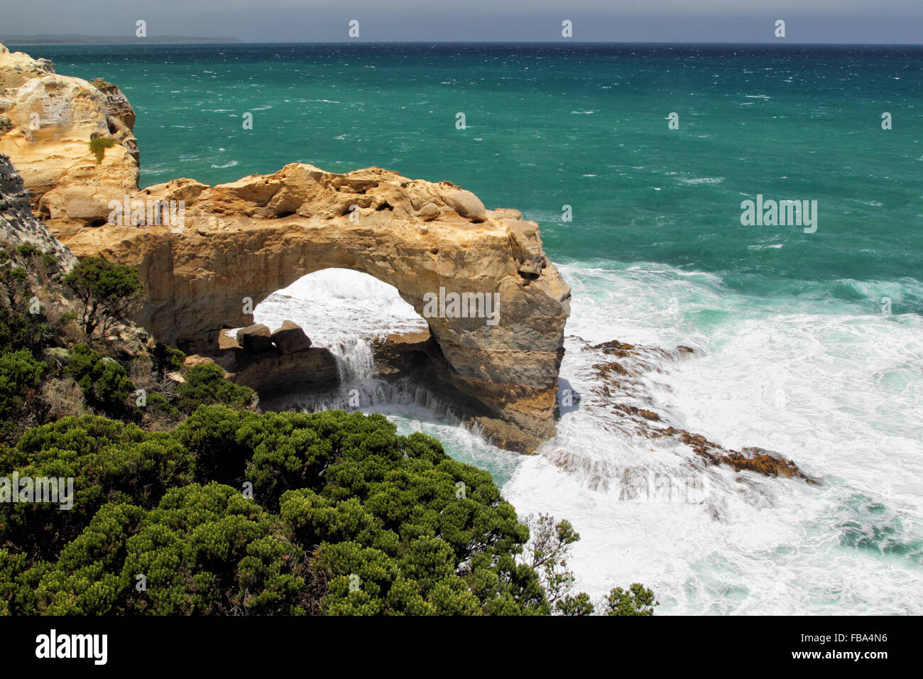 The Arch, a pierced rock in the Port Campbell National Park at the Great Ocean Road in Victoria, Australia. Stock Photo