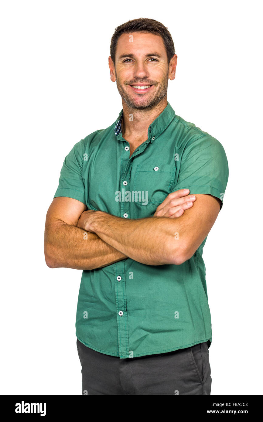 Smiling man with arms crossed Stock Photo