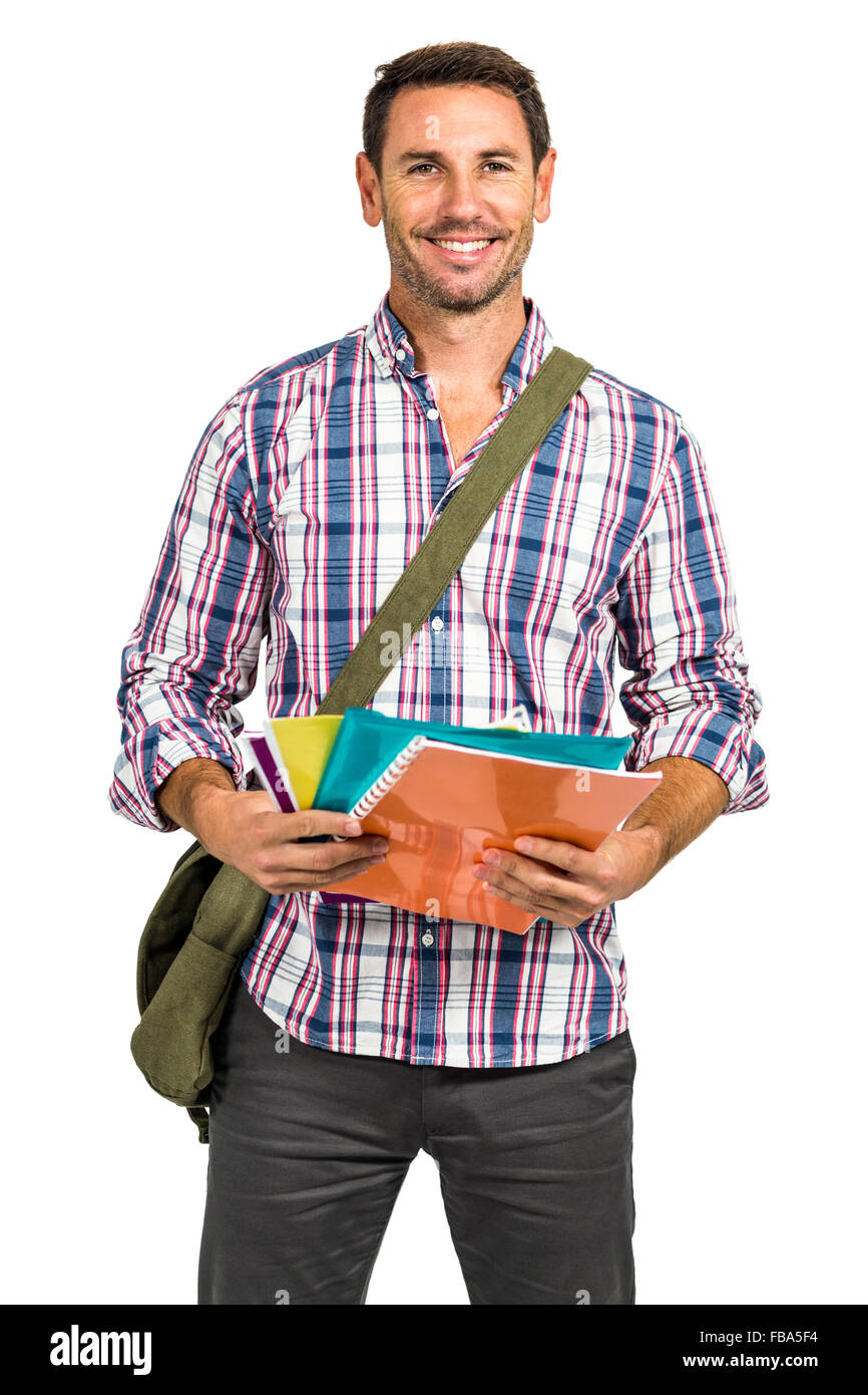 Confident man holding notepads Stock Photo