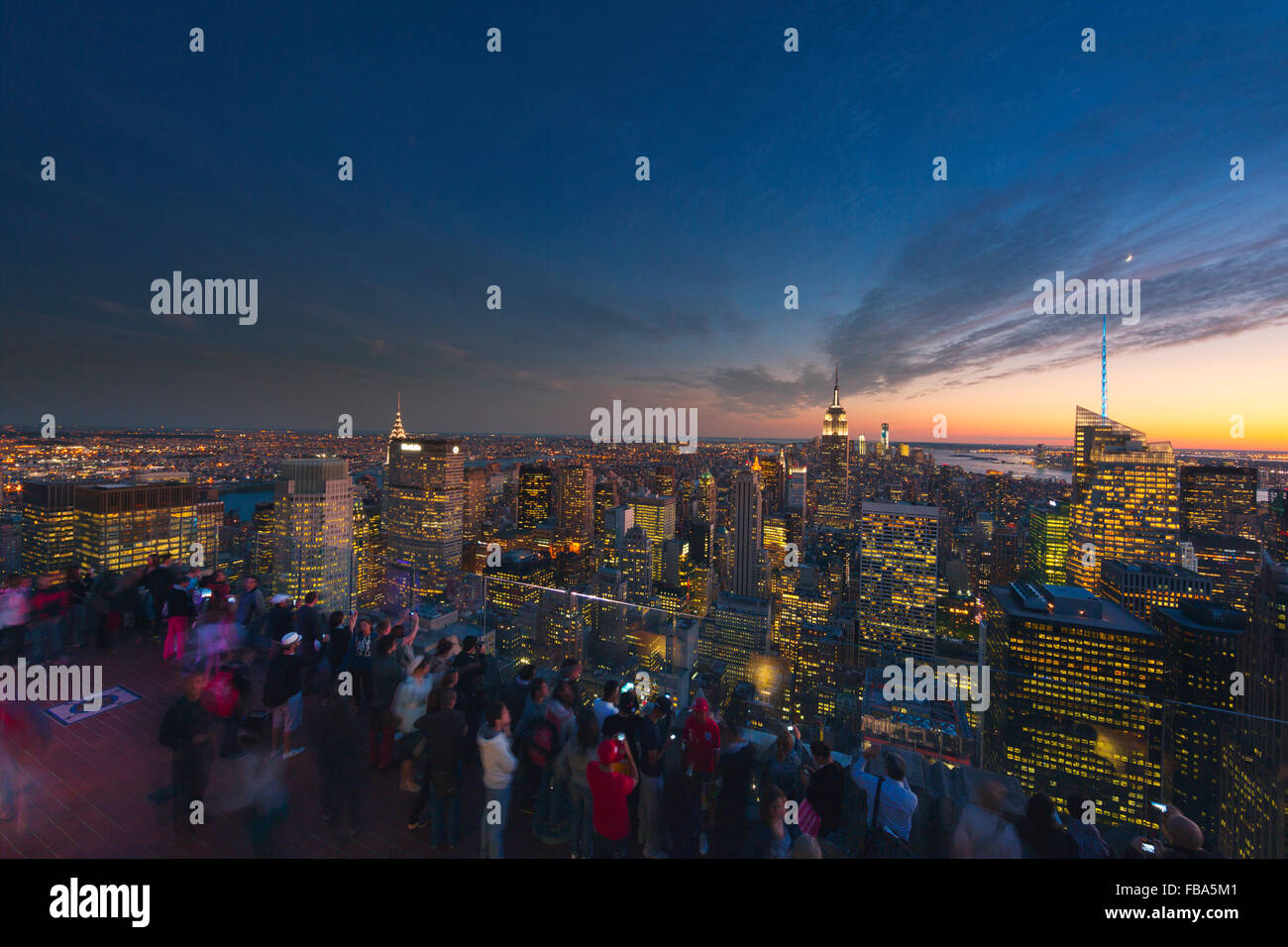 USA, New York State, New York City, Manhattan, View of cityscape from top of Rockefeller Center at dusk Stock Photo