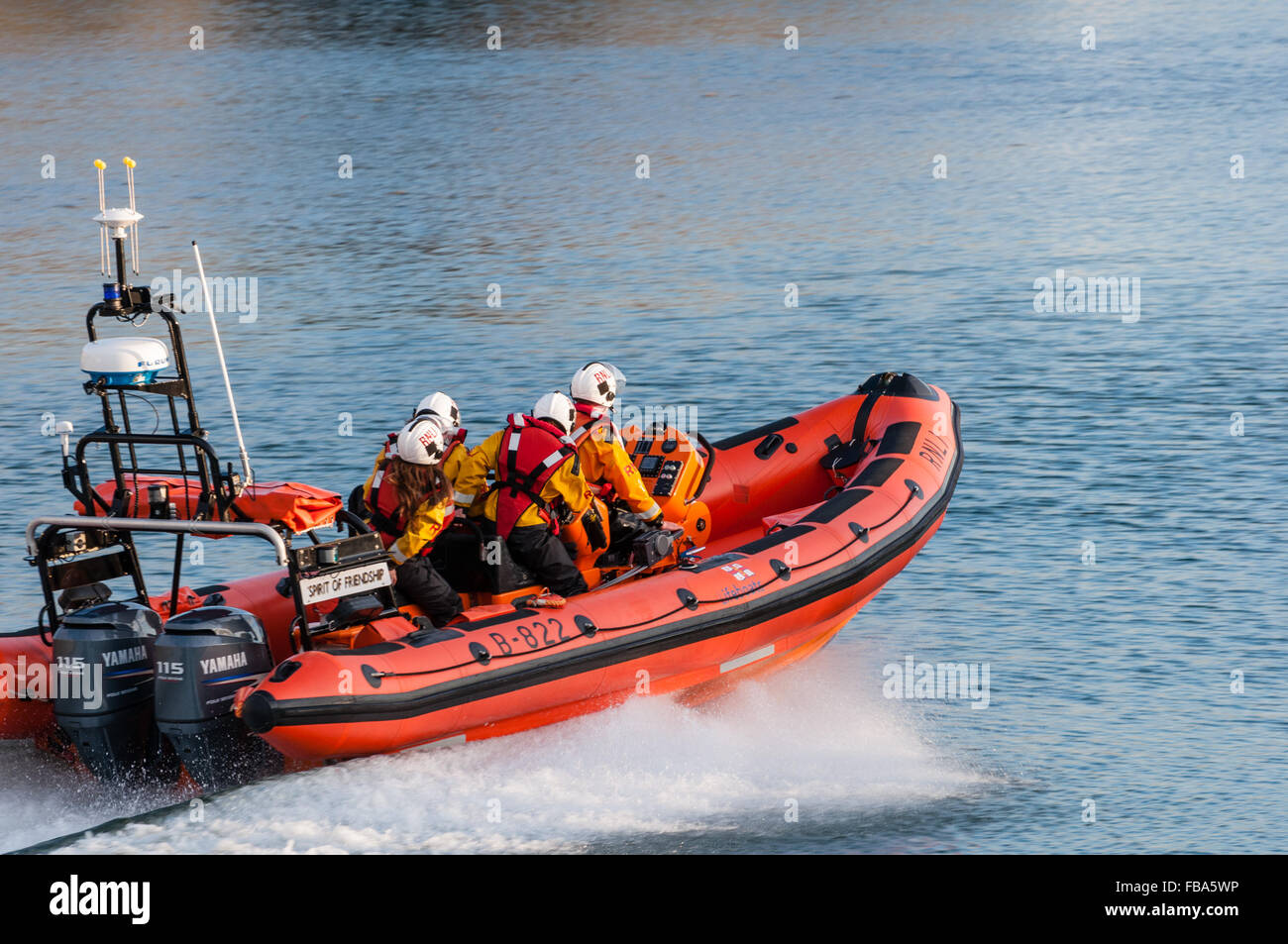 RNLI lifeboat heading out to sea at Aberystwyth, Wales. Stock Photo