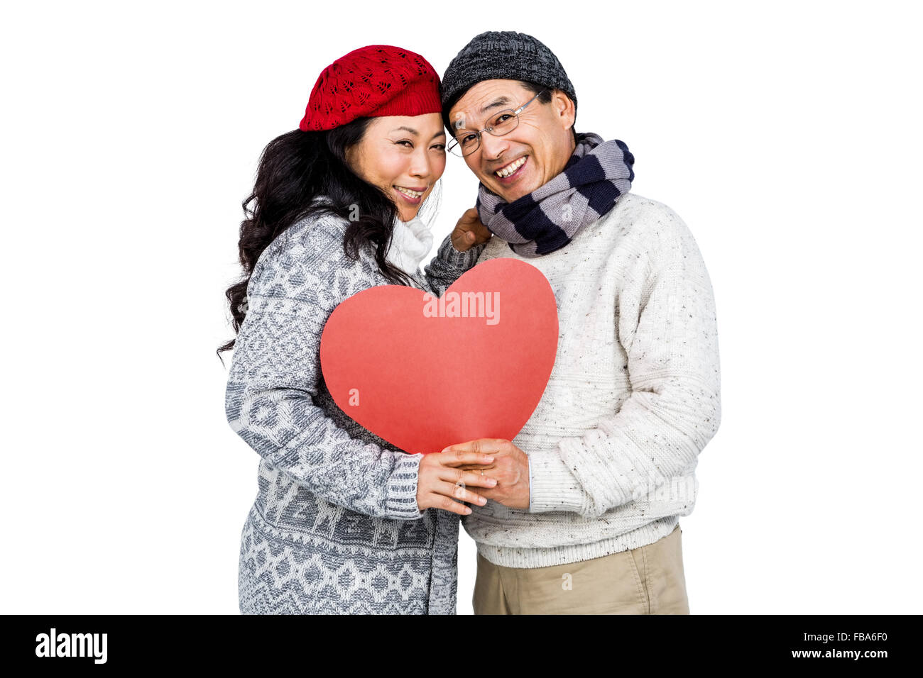 Portrait of happy couple with balloon Stock Photo - Alamy