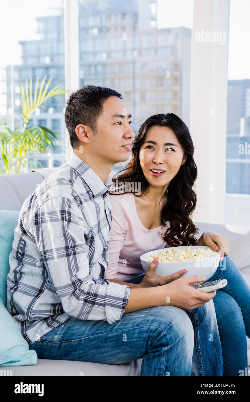 Woman man sitting on sofa hi-res stock photography and images - Alamy