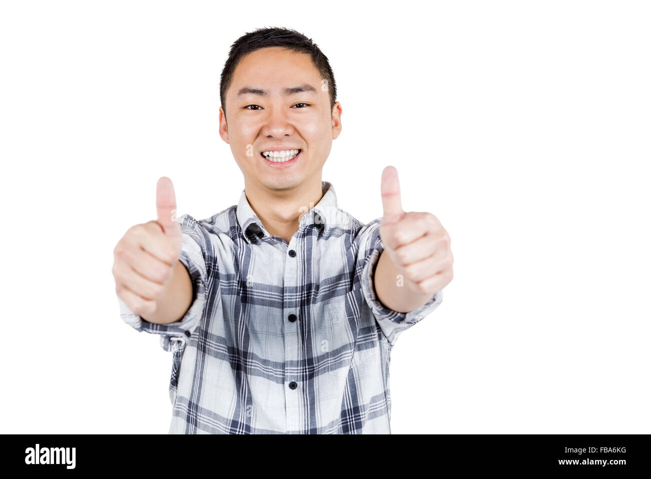 Happy man showing thumps up a Stock Photo