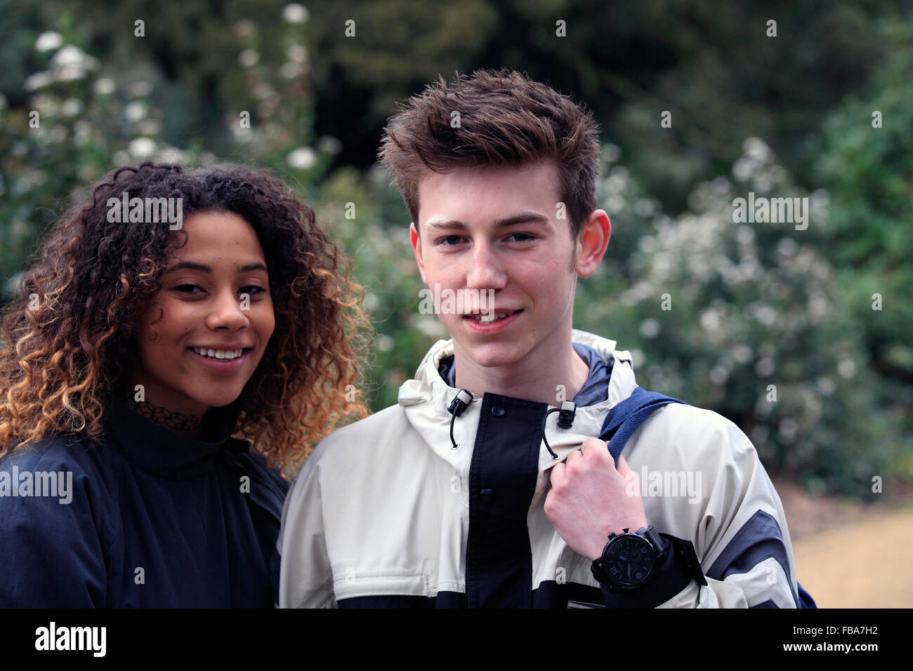 united kingdom london chiswick a young mixed race teenage couple walking in the grounds of chiswick house Stock Photo