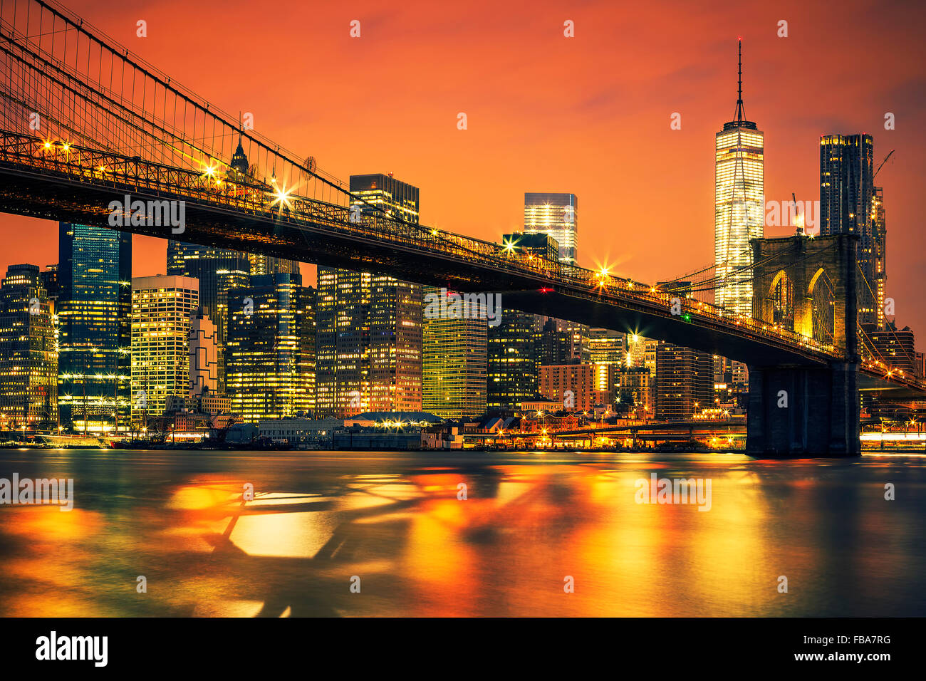New York City Manhattan midtown at sunset with Brooklyn Bridge Stock ...