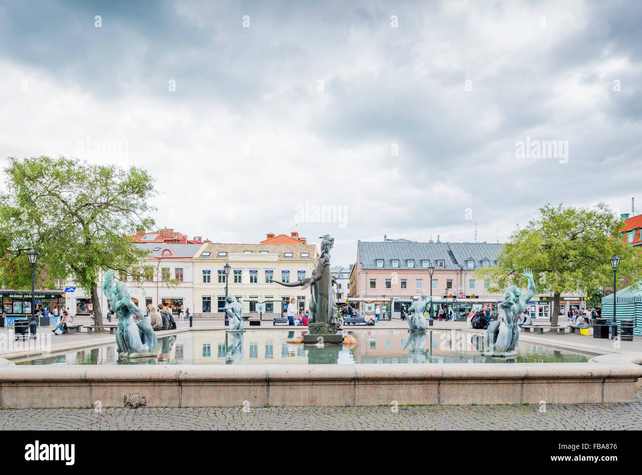 Sweden, Halland, Halmstad, Storatorg, Europa and Bull statue in fountain with buildings in background Stock Photo