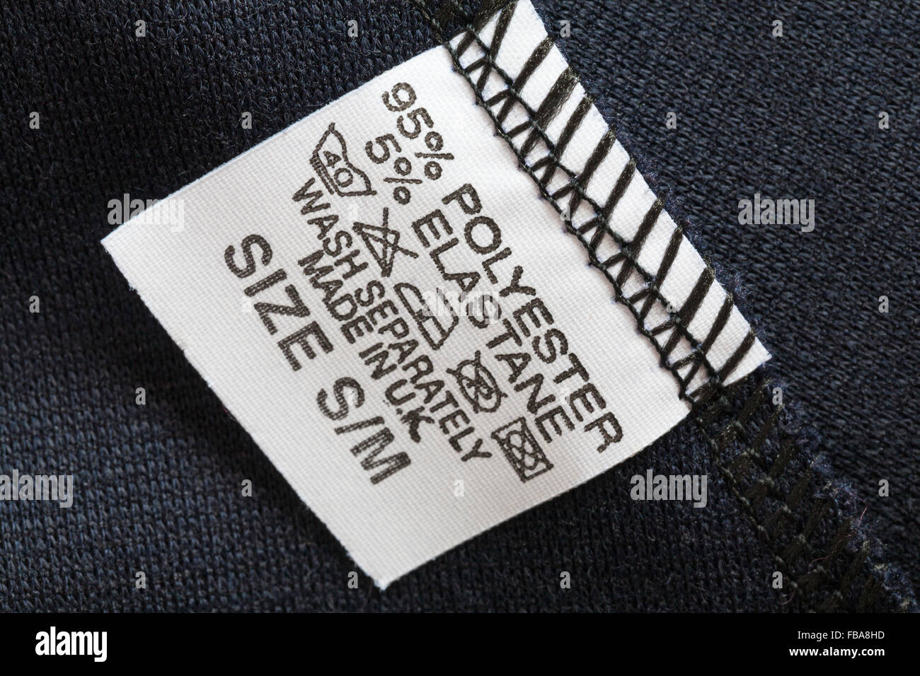 Label In Clothing 95 Polyester 5 Elastane Wash Separately Made In Uk Size S M Care Washing Symbols And Instructions Stock Photo Alamy