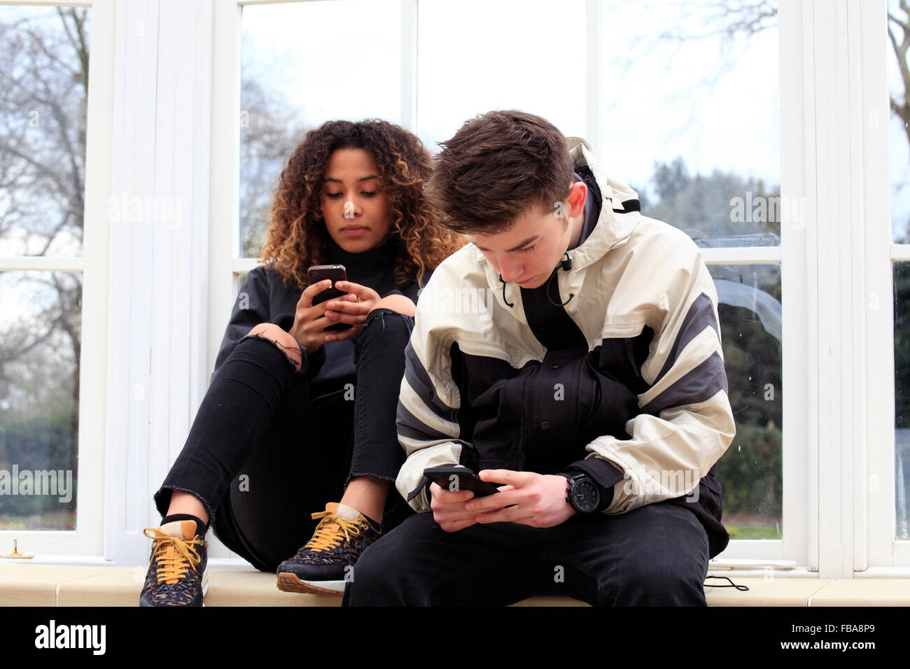 united kingdom london chiswick a young mixed race teenage couple walking in the grounds of chiswick house Stock Photo