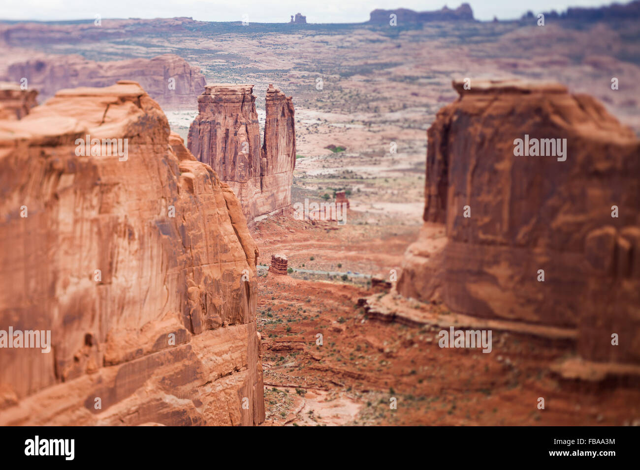 Red sandstone butte, Arches National Park, tilt shift effect Stock Photo