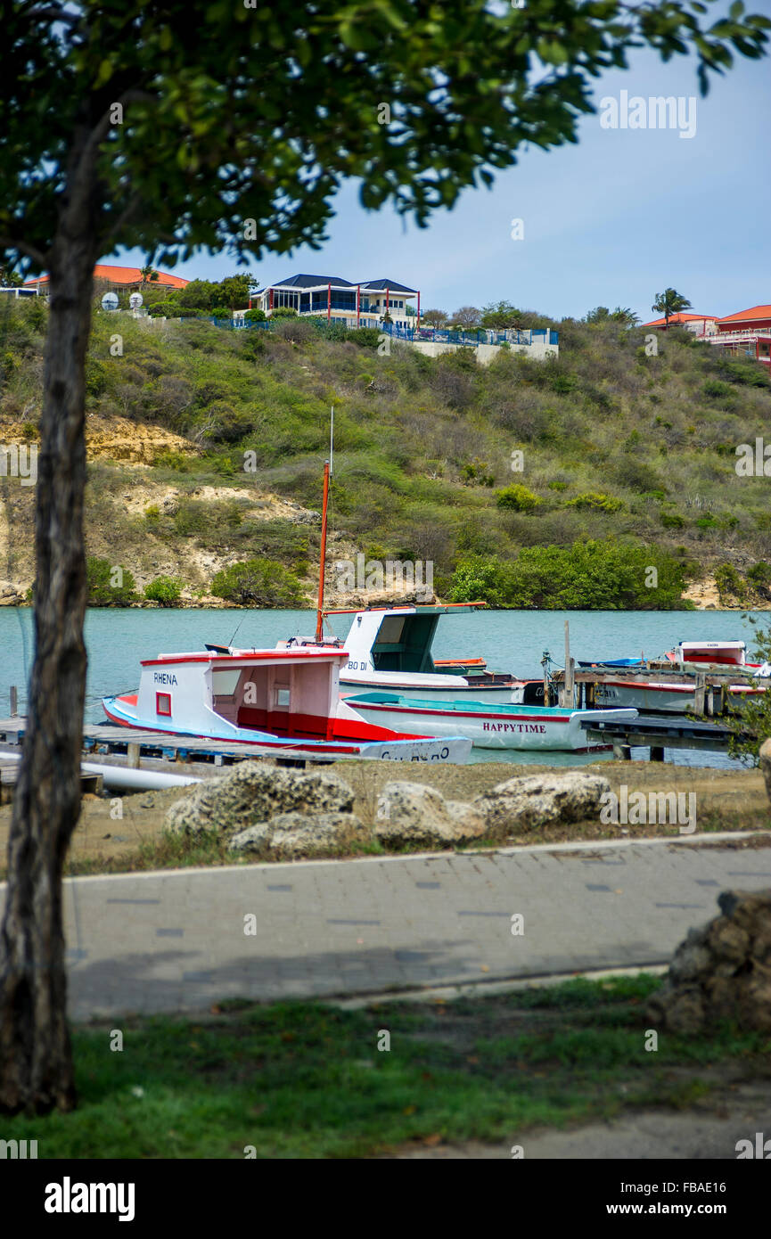 Fishing Boats ashore Caracas bay in Curacao Stock Photo