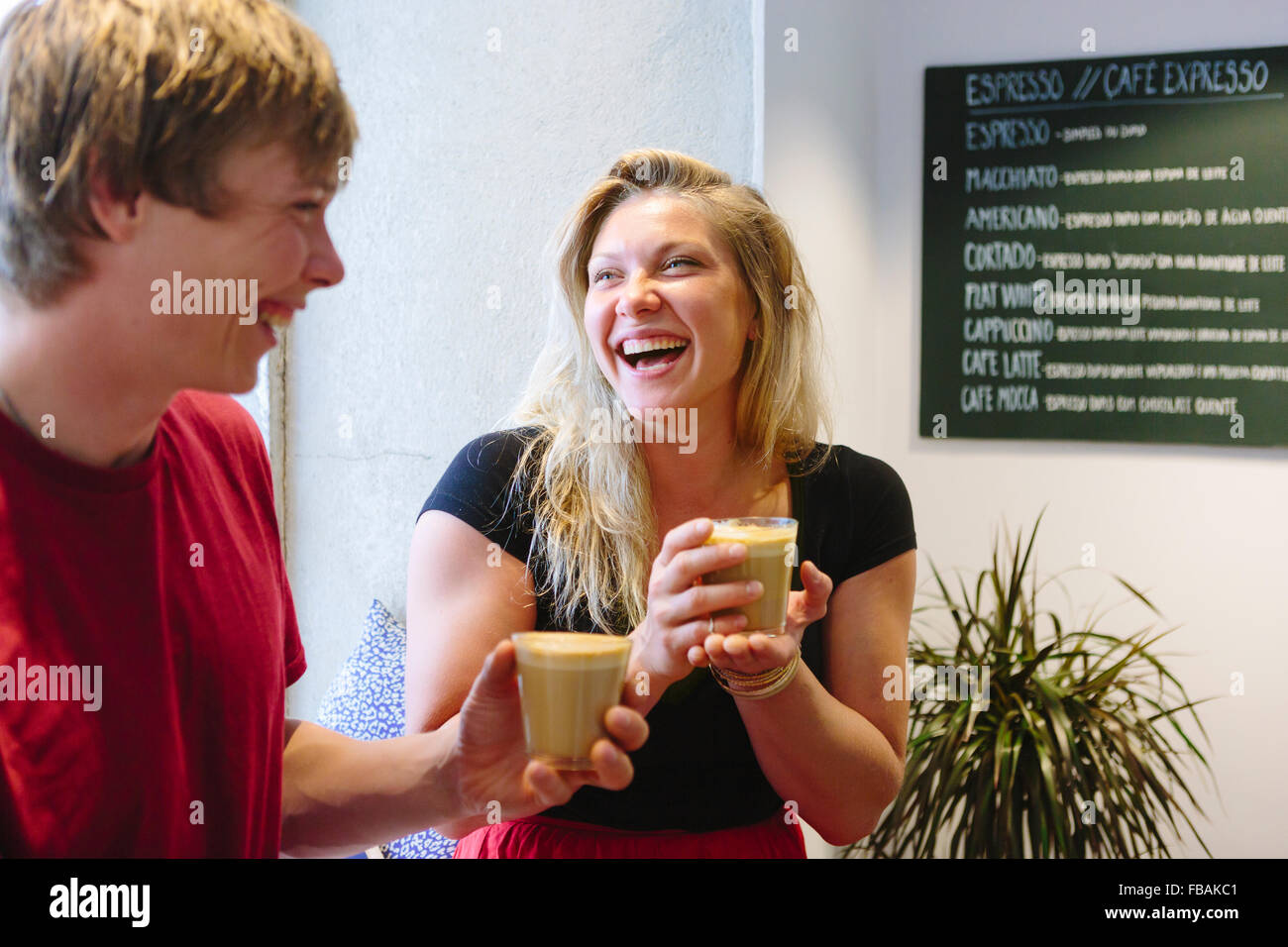 Portugal, Lisbon, Two young people laughing Stock Photo