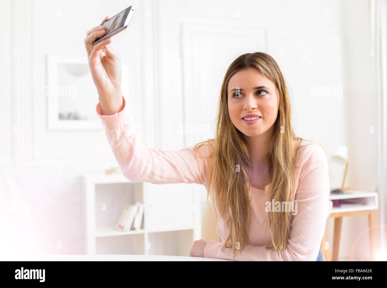 View of a Young attractive woman taking selfie at home Stock Photo - Alamy