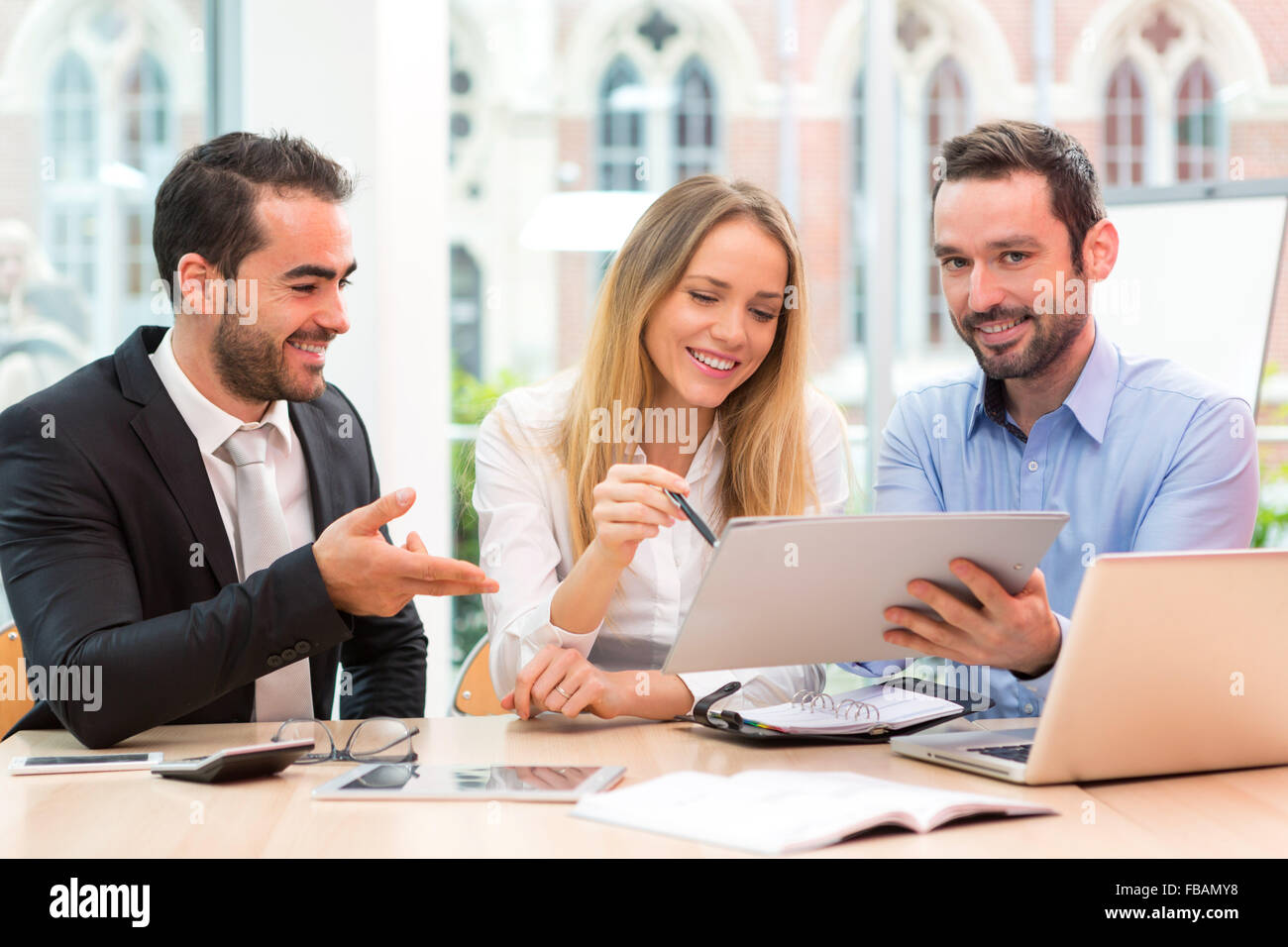 View of a Group of business people working together at the office Stock ...