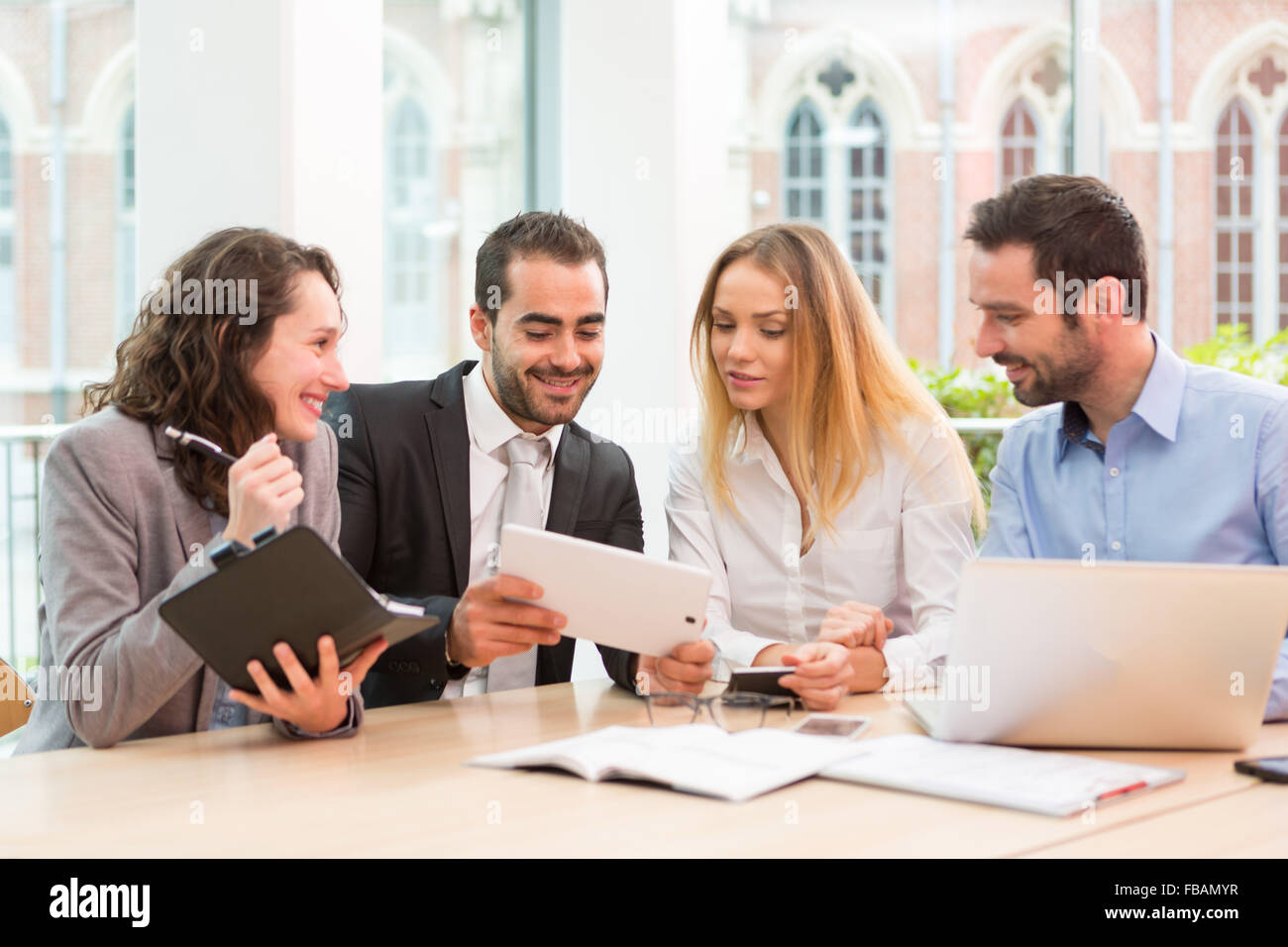 View of a Group of business people working together at the office Stock ...
