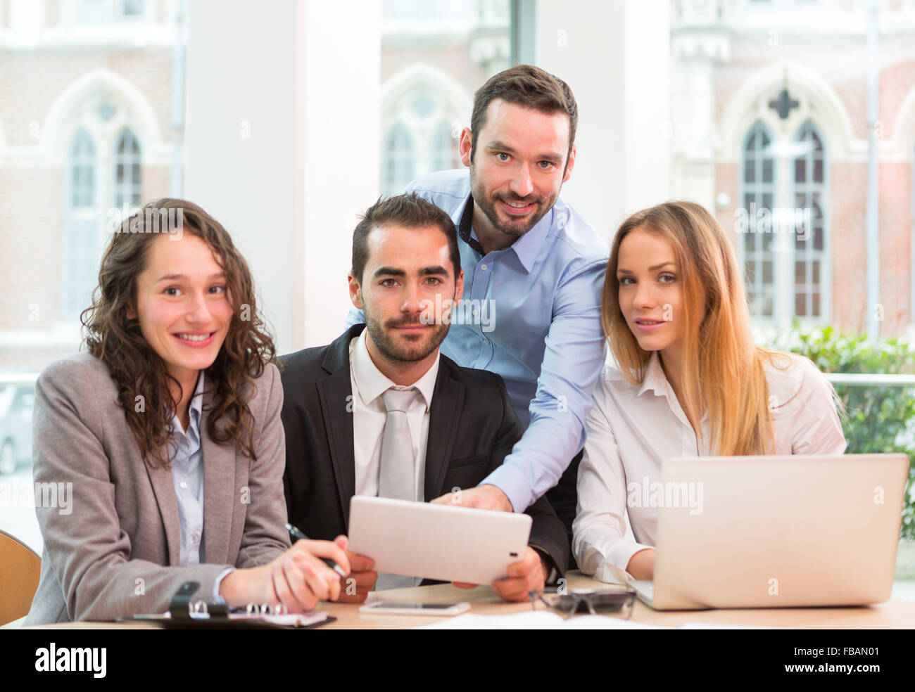 View of a Group of business people working together at the office Stock ...