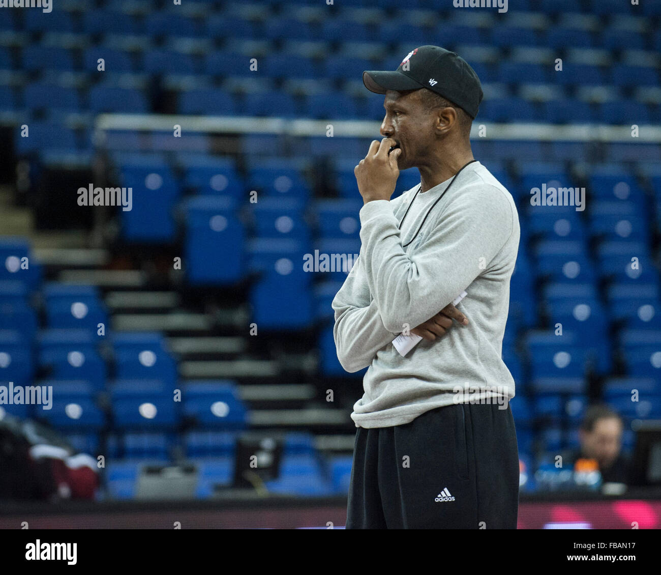 London, UK. 13th January, 2016.  Toronto Raptors head coach Dwane Casey watches the activities at the Media day ahead of the NBA Global Games London 2016. Orlando Magic and the Toronto Raptors- Credit:  Stephen Bartholomew/Alamy Live News Stock Photo